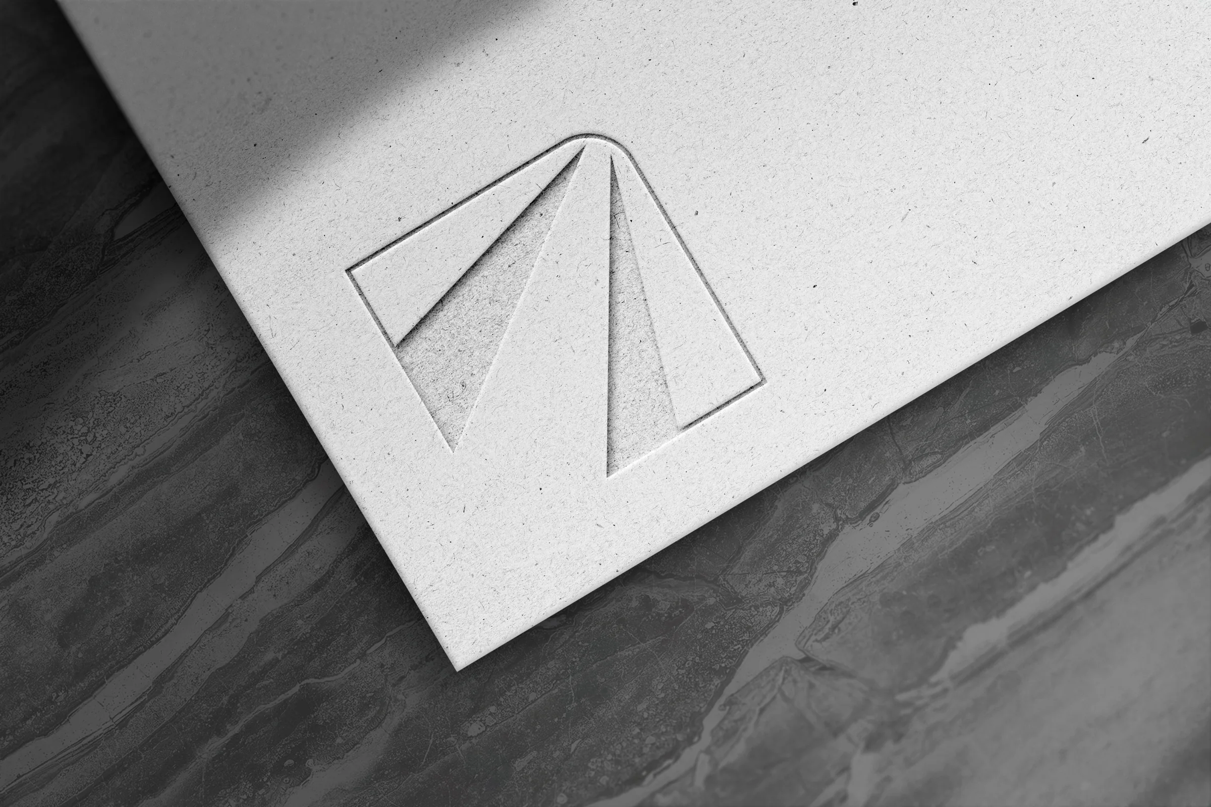 Oran Engineers, embossed monogram on paper mockup