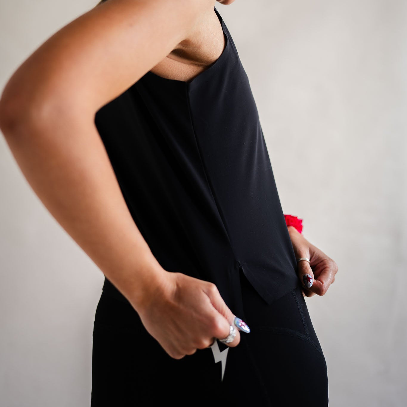 Meander VestCyclist wearing LUCA Meander vest in black, side view showing relaxed fit