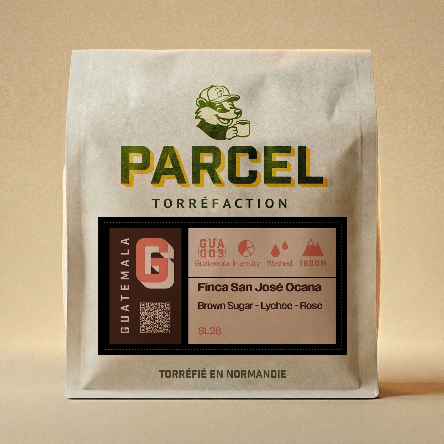 Parcel Torréfaction Guatemala Finca San José Ocana bag with tasting notes of brown sugar, lychee, and rose, featuring SL28 varietal, positioned upright on clean background for readability.