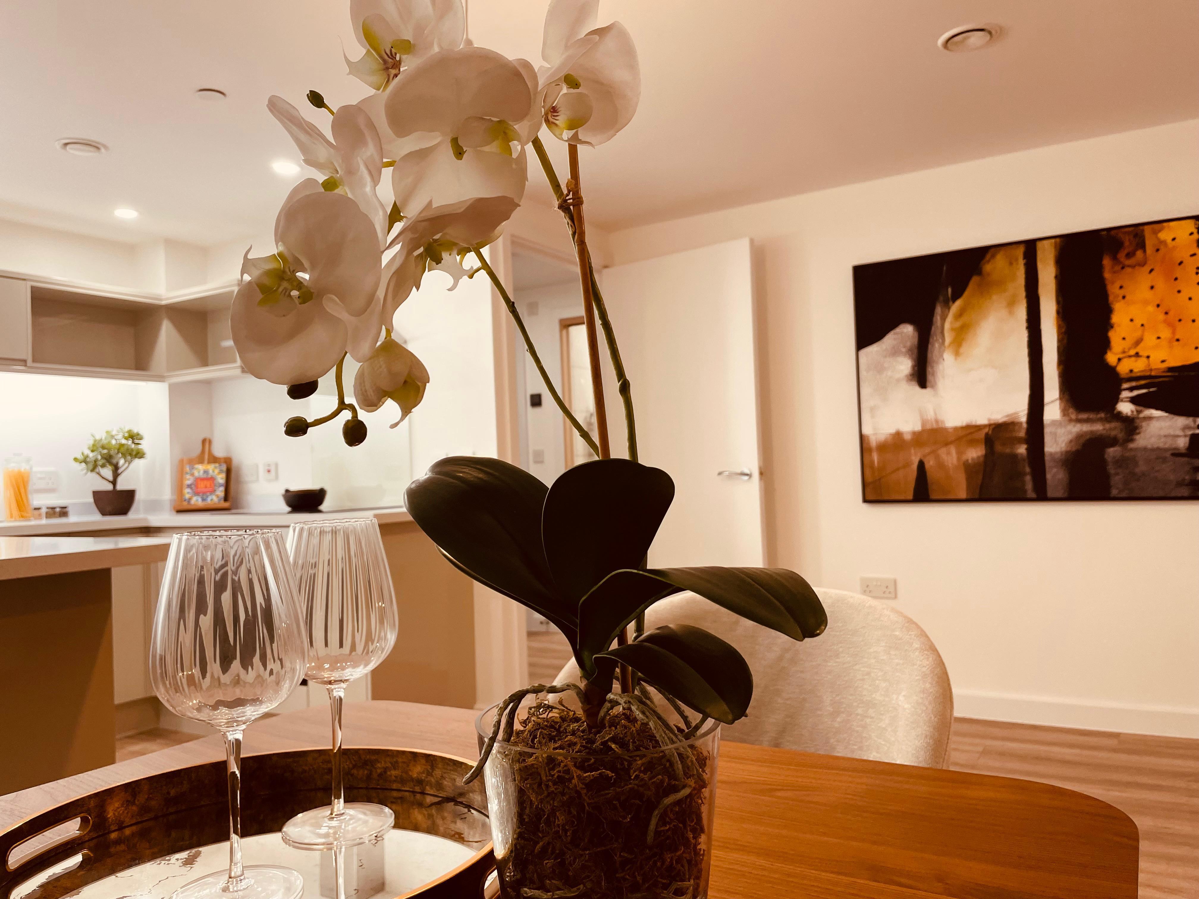 Detail shot of dining area in open plan Leeds show flat