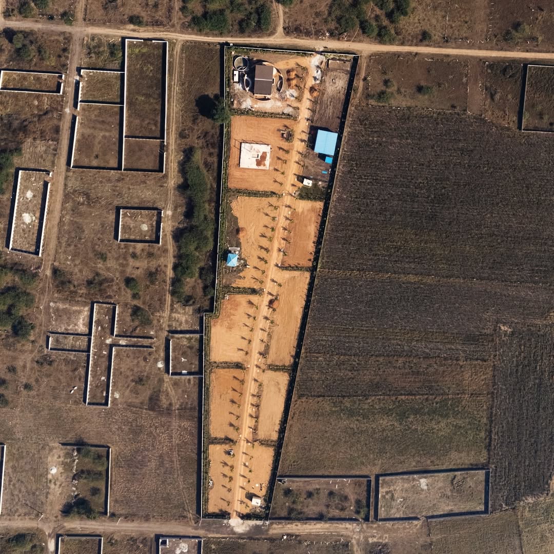white modern cement building under blue sky