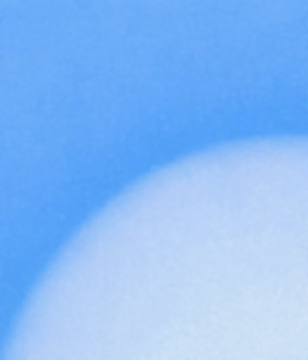 A close-up of a soft blue gradient with a white circular shape in the foreground, creating a calm, serene atmosphere.