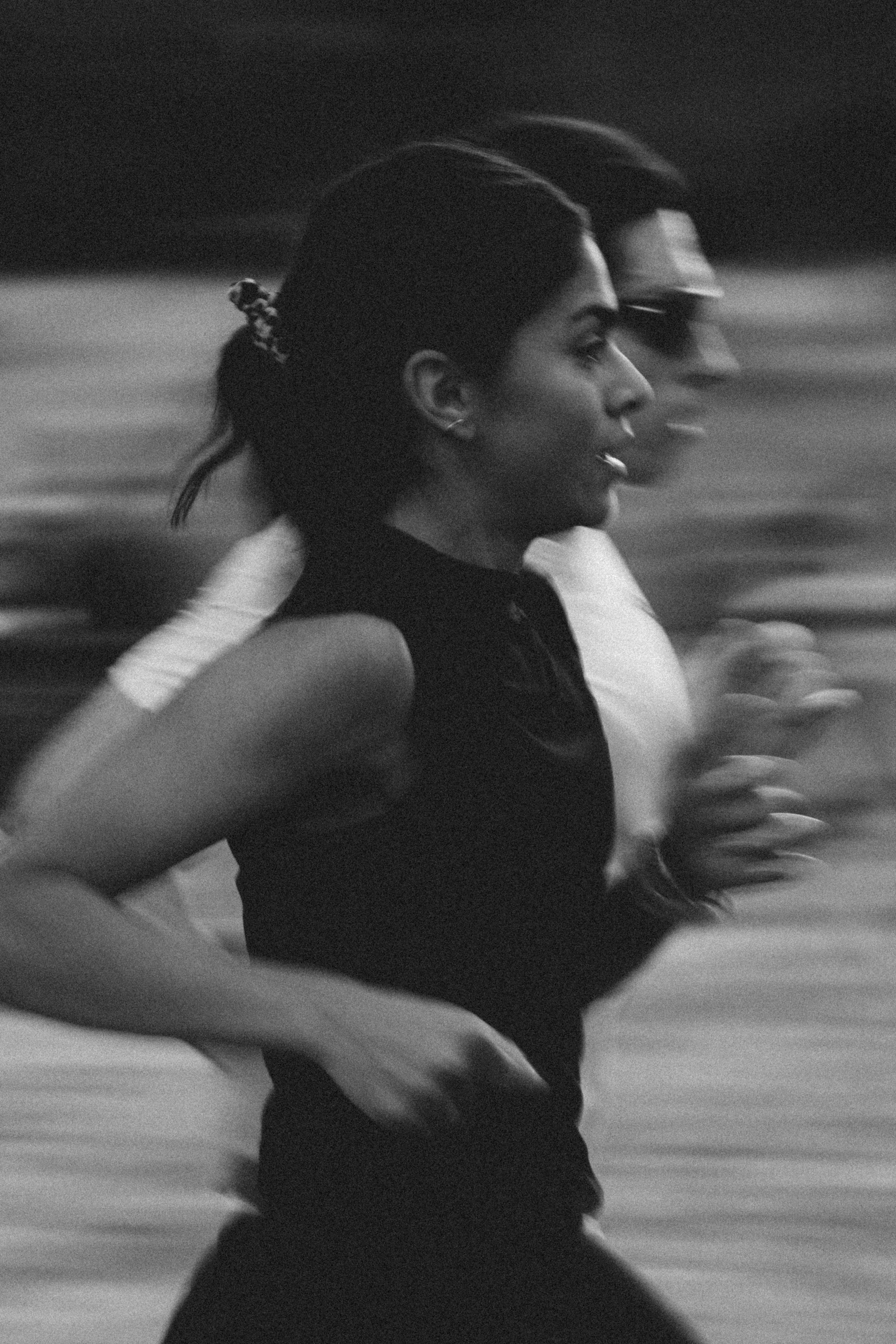 pair of blue-and-white Adidas running shoes