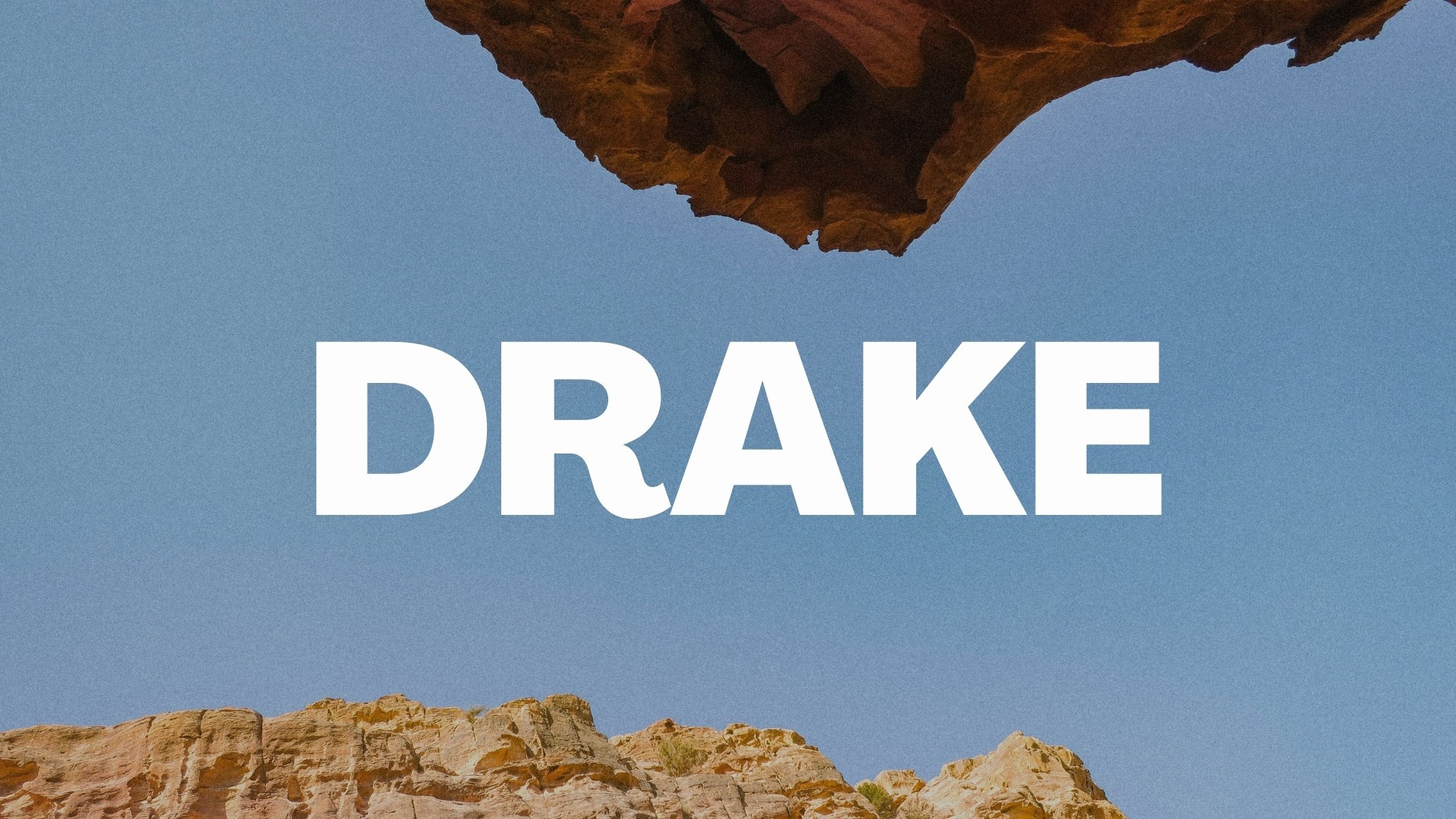 man wearing black sweater riding ATV during cloudy day