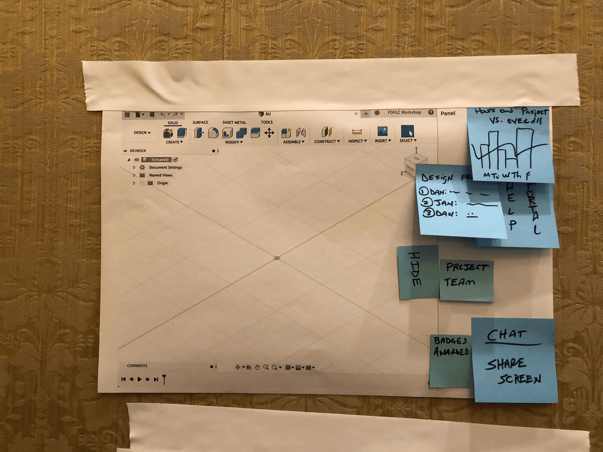 Photo of a paper mockup of the Fusion desktop app and learning panel