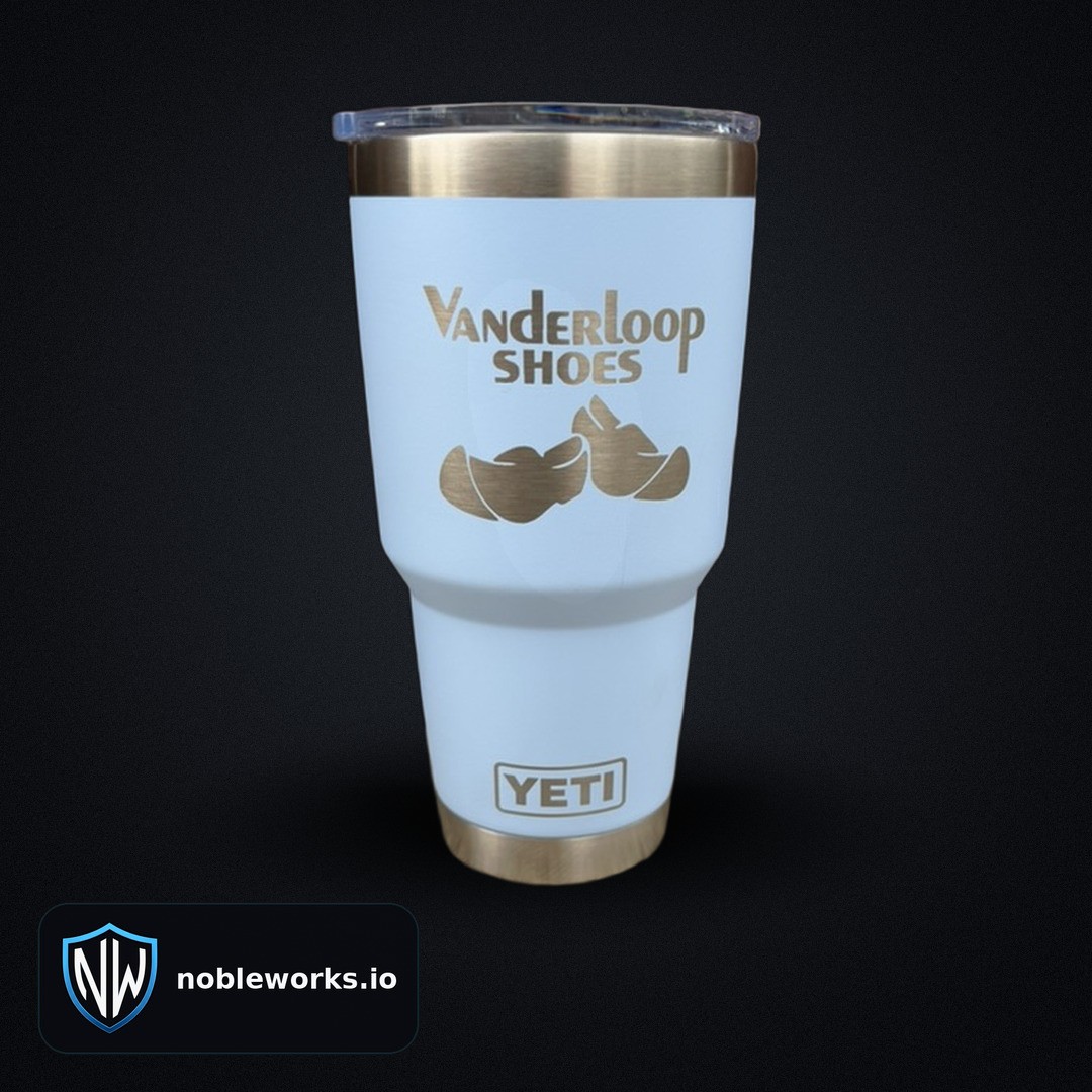 Light blue YETI Rambler laser engraved with the Vanderloop Shoes logo and Dutch clogs artwork