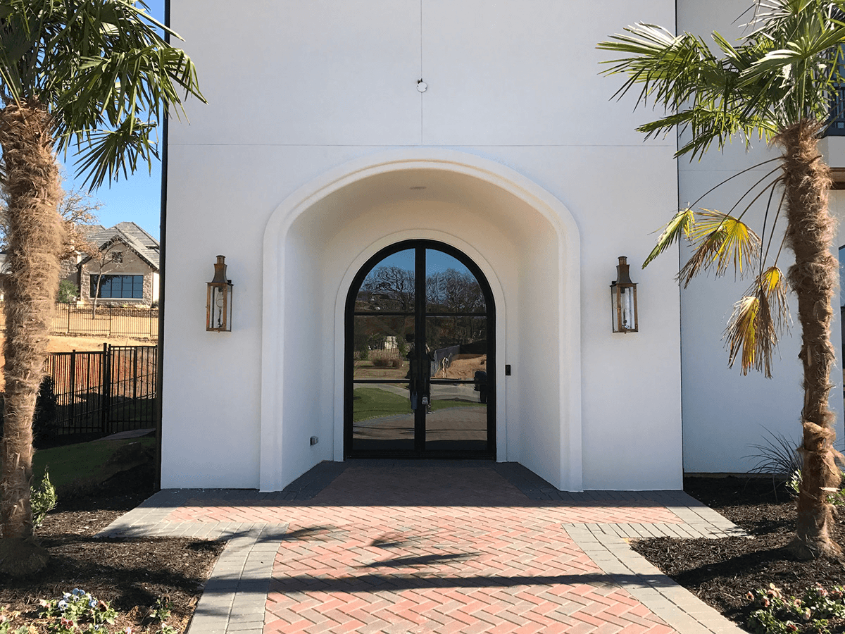 Traditional wrought iron double doors by M2 Metals Iron Doors DFW