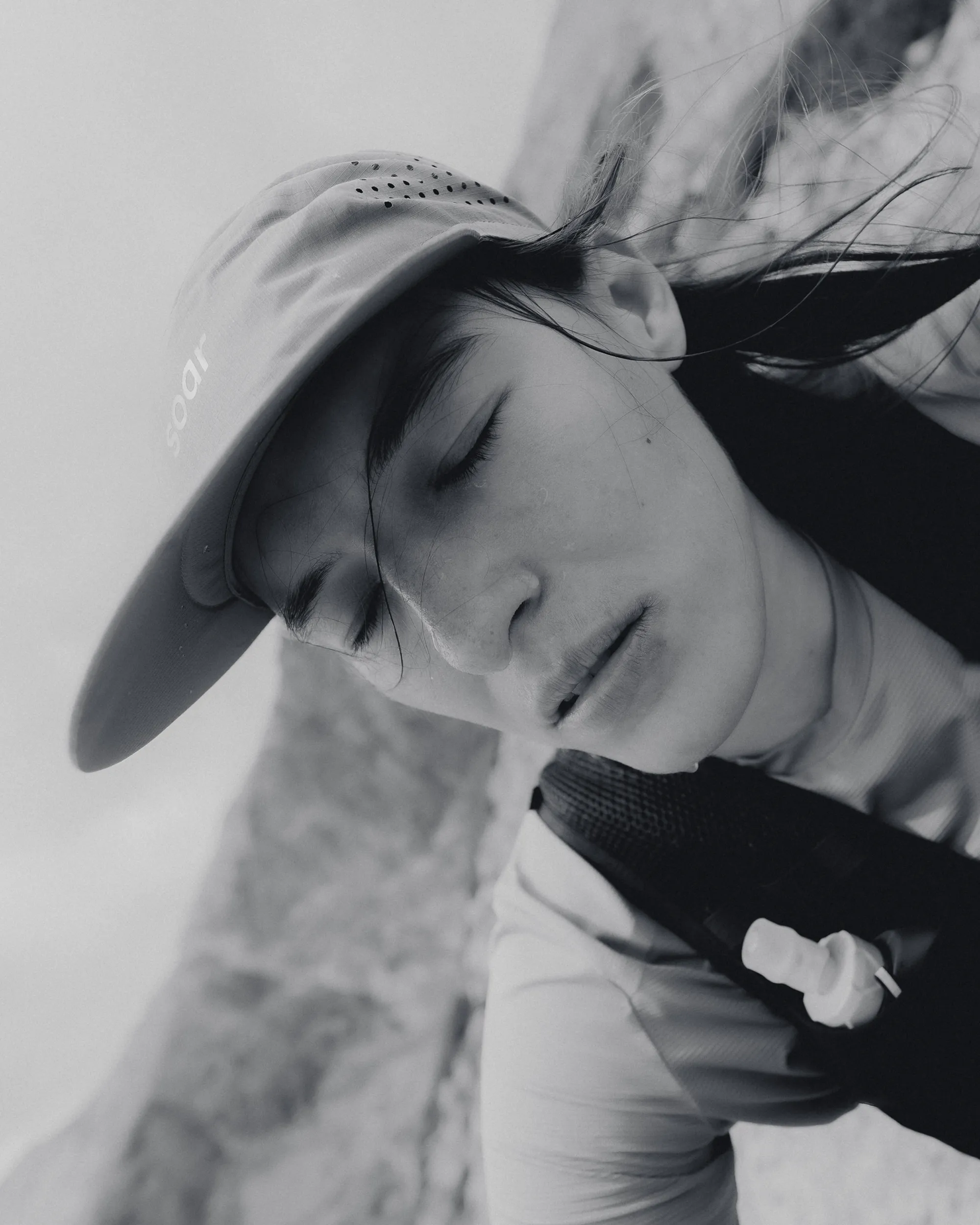 portrait of a woman trail running.