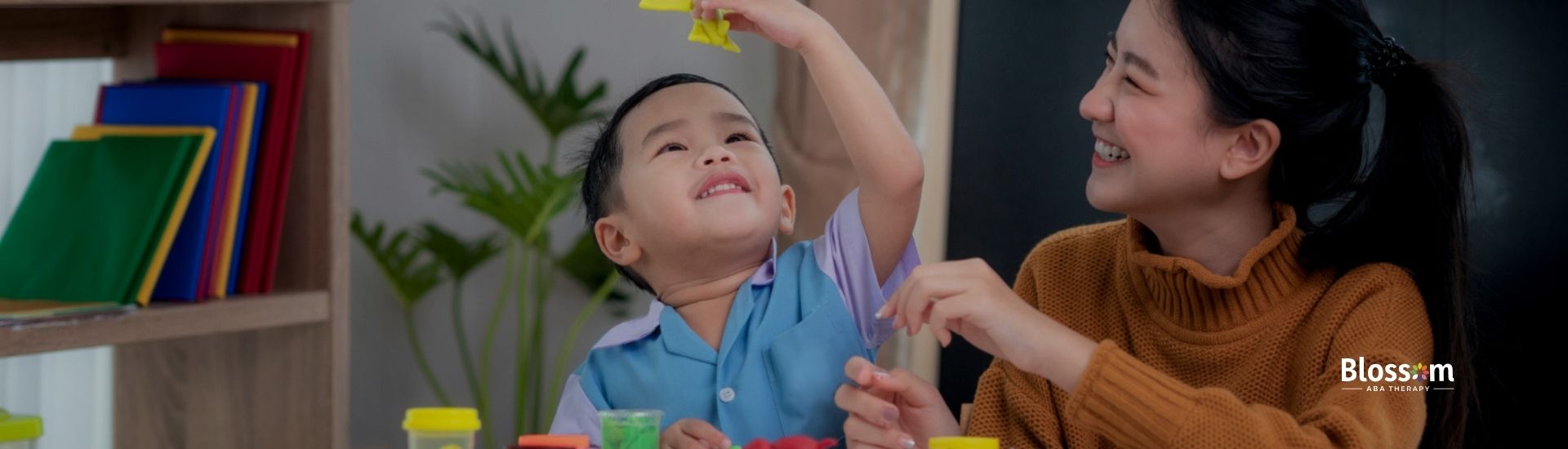 Child engaging in ABA therapy with therapist using play activities.