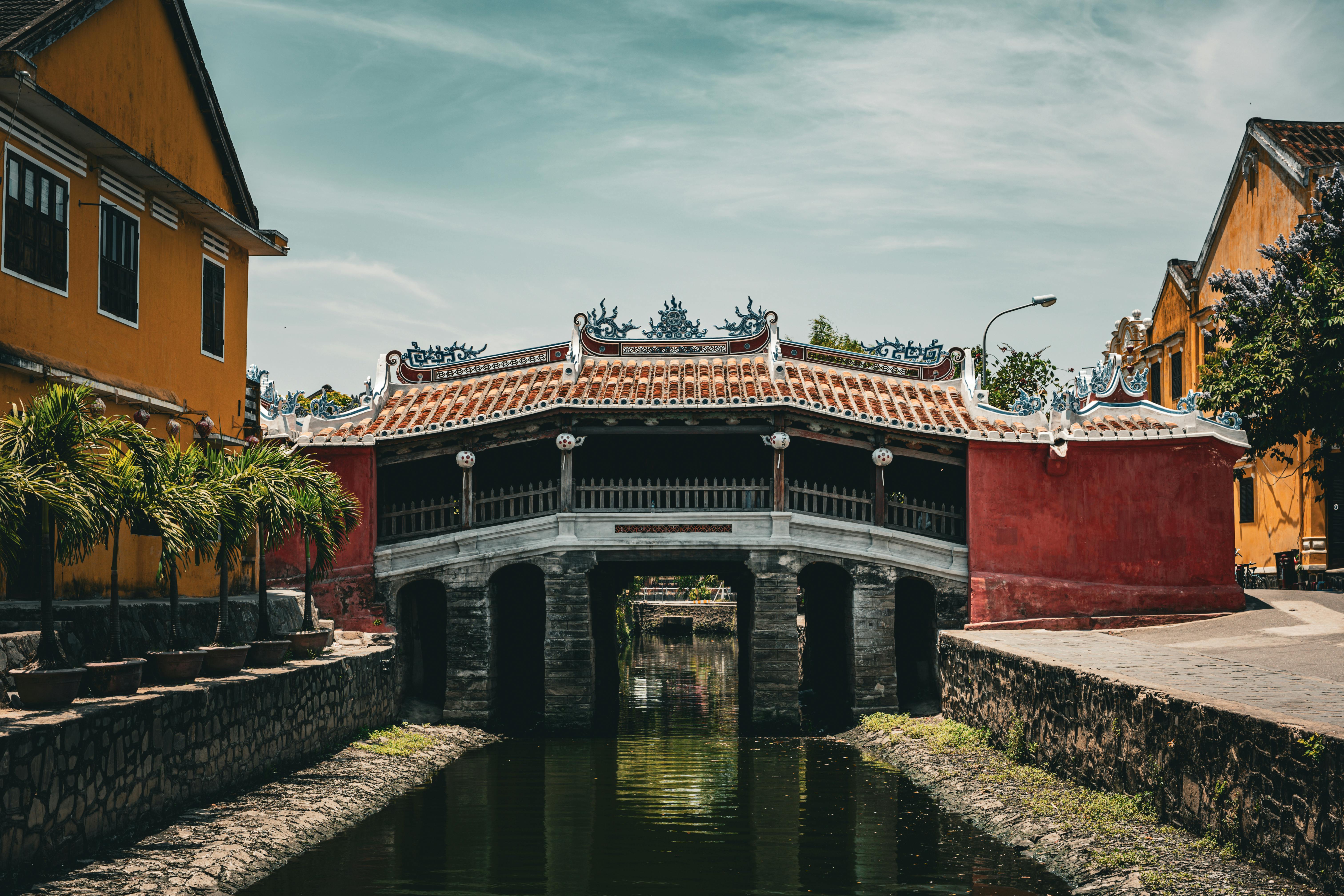 Scenic view of the iconic Japanese Covered Bridge in Hội An, Vietnam, under a clear sky