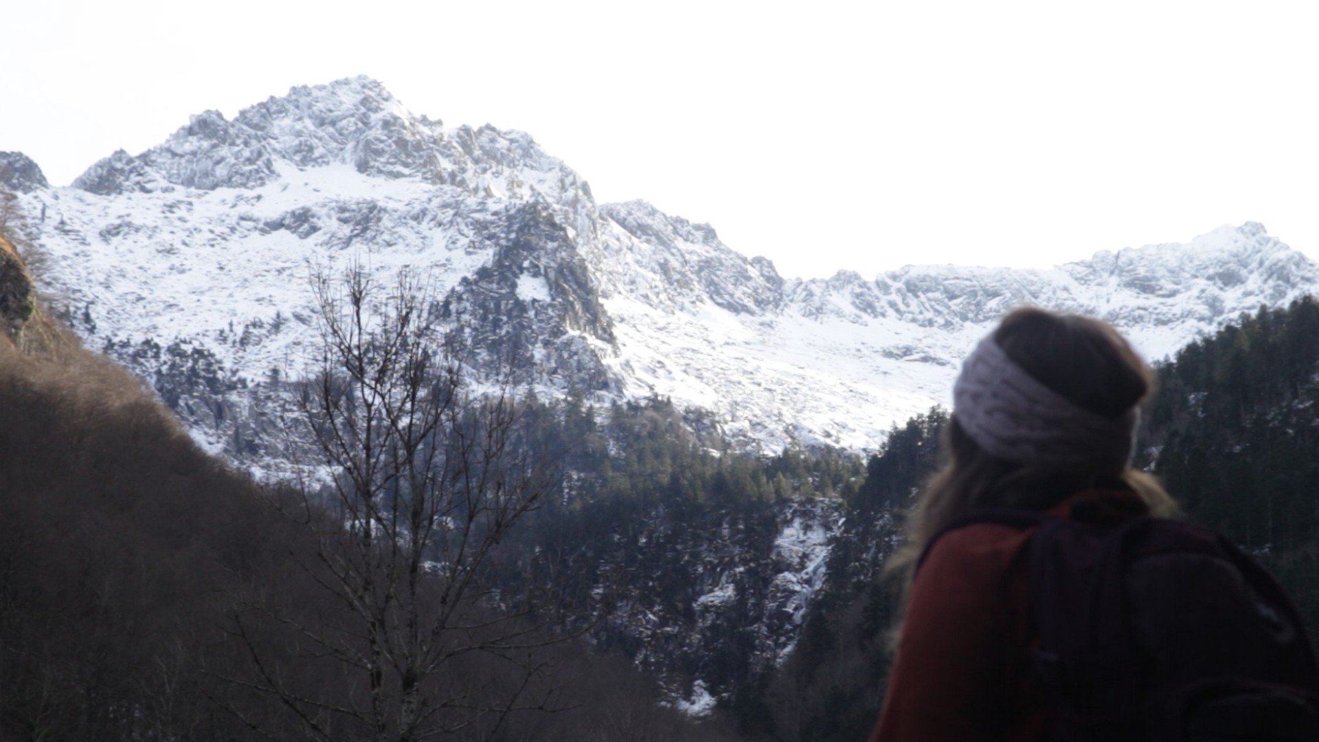 woman looking at a mountain