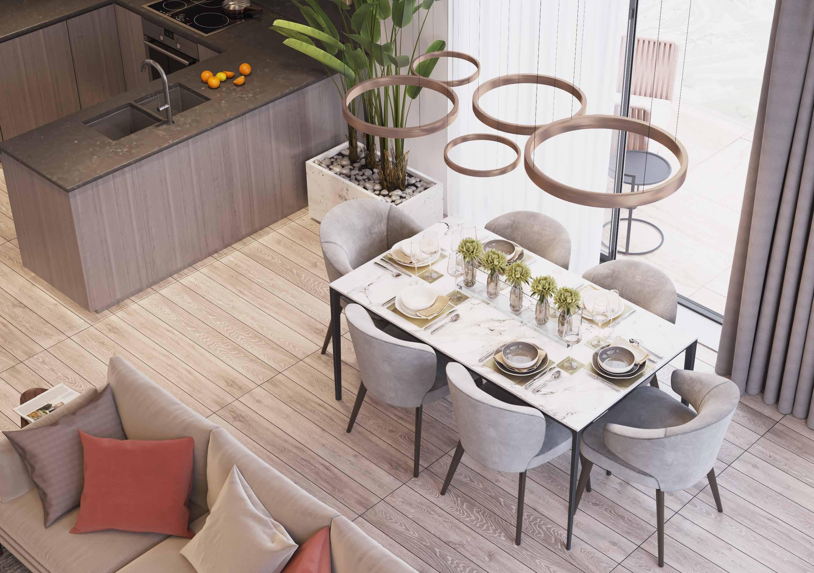 Contemporary open-plan dining and kitchen area, ideal for upscale residential property marketing.