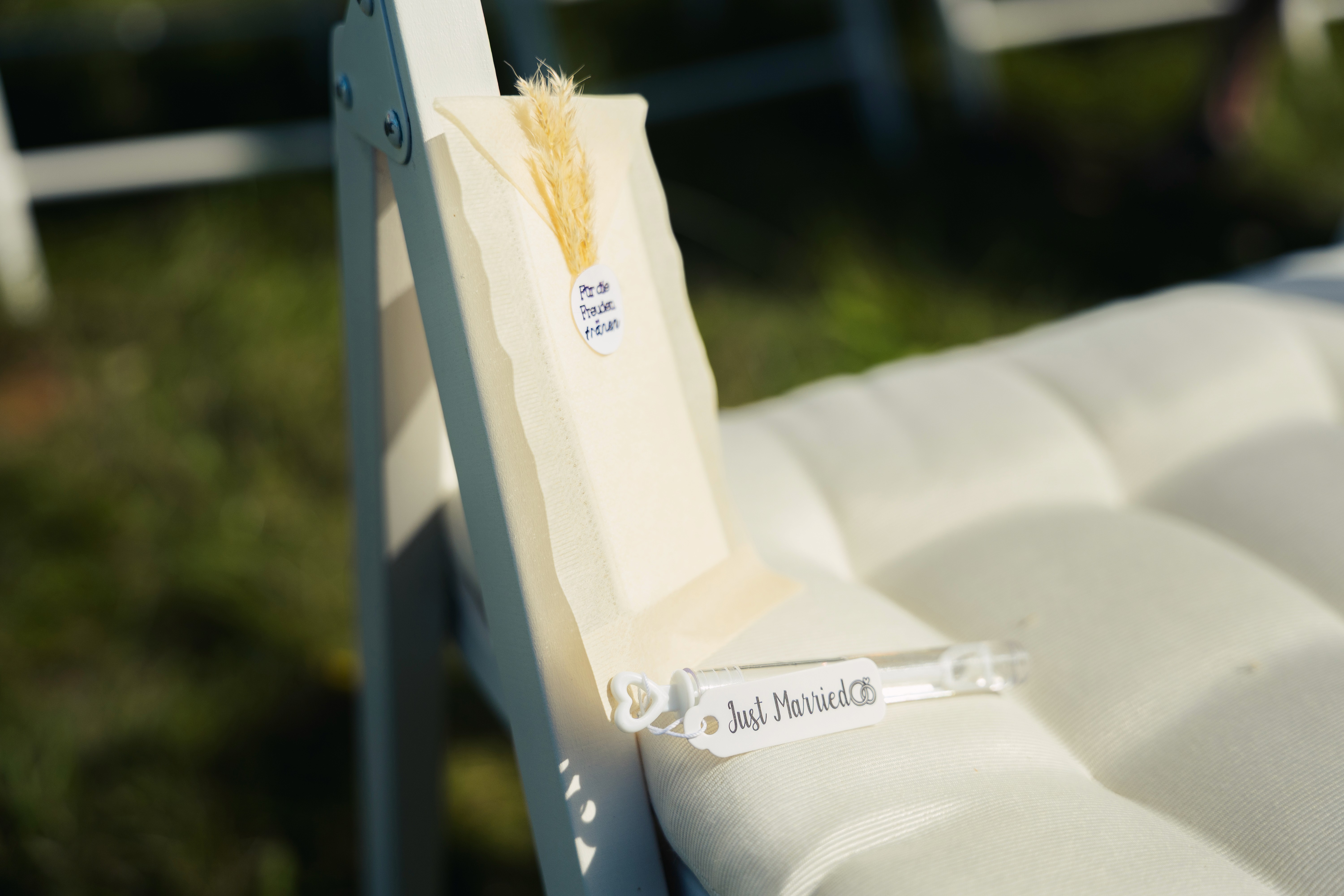 Woman in cowboy hat looking over shoulder at sunset