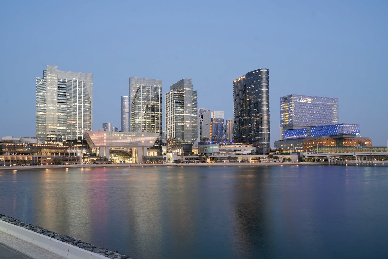 A picture of ADGM with a waterfront view in Abu Dhabi. 