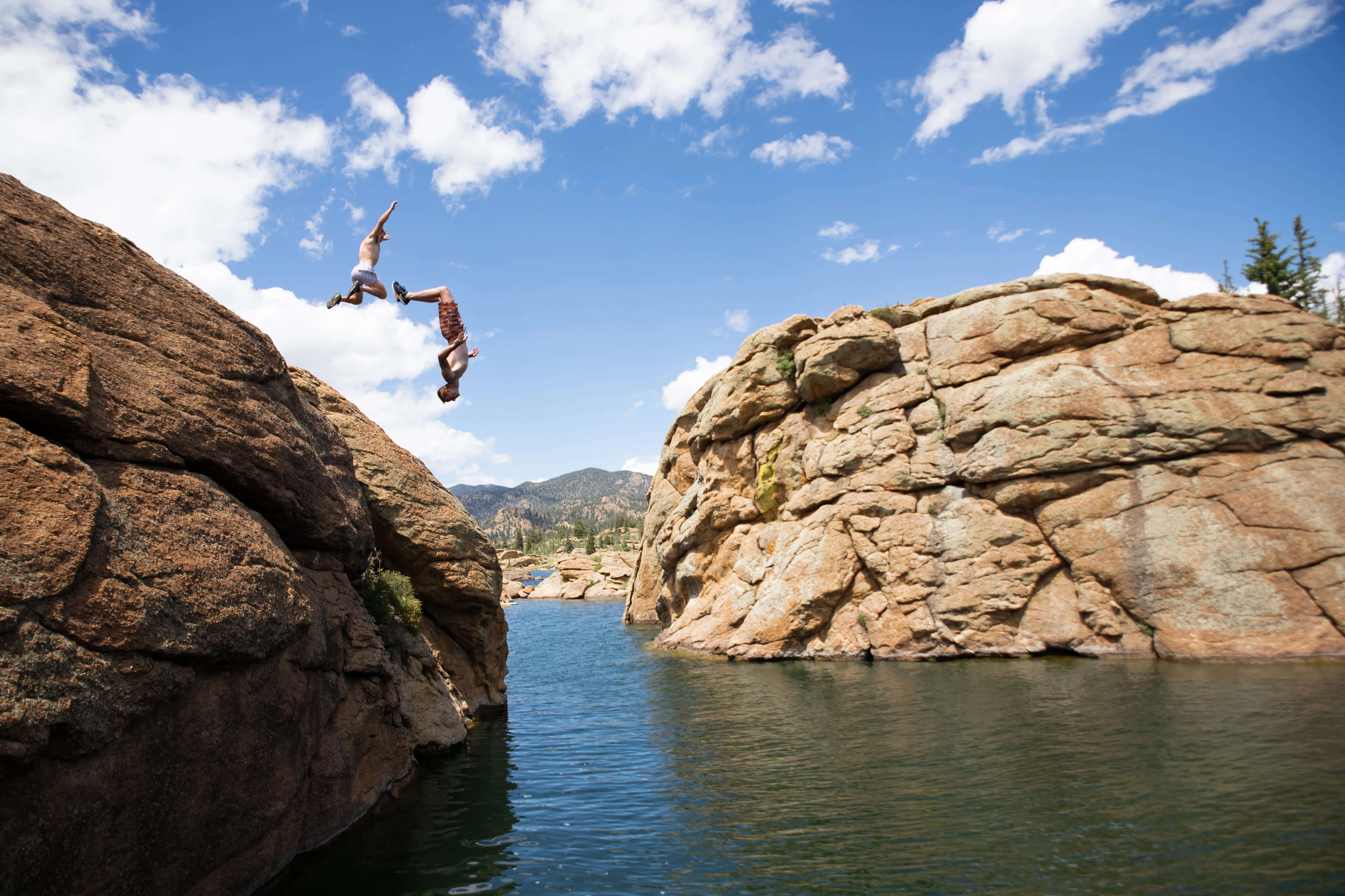 Streetside billboard with flyposters of the Batch.Works brand and illustrations