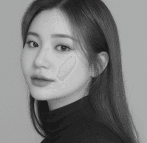 man standing beside wall