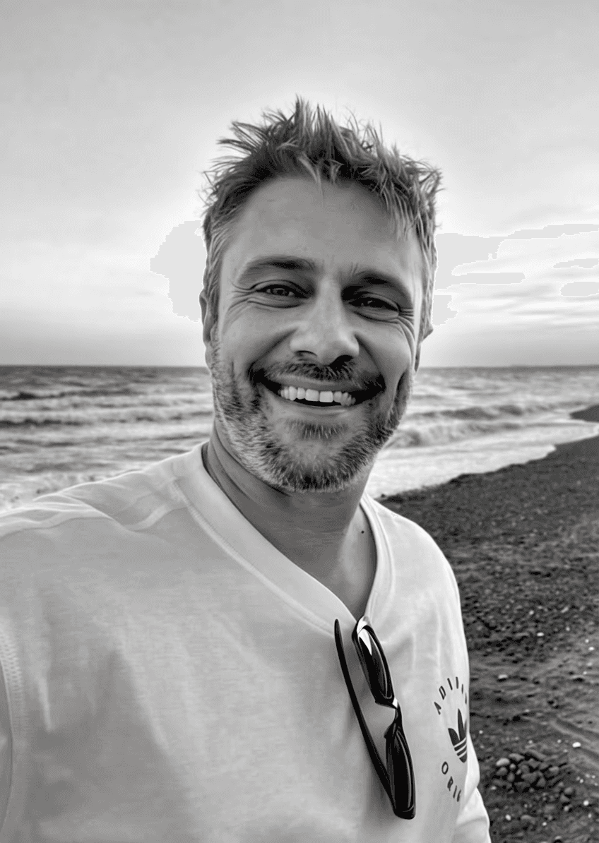 man in black knit cap and black framed eyeglasses