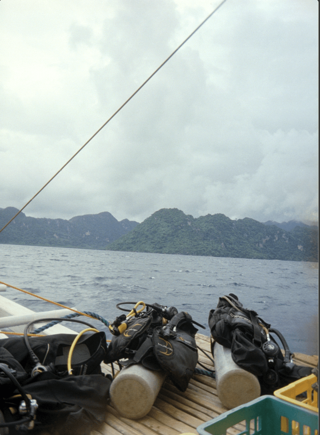 Person sitting on a ledge overlooking New York City skyline