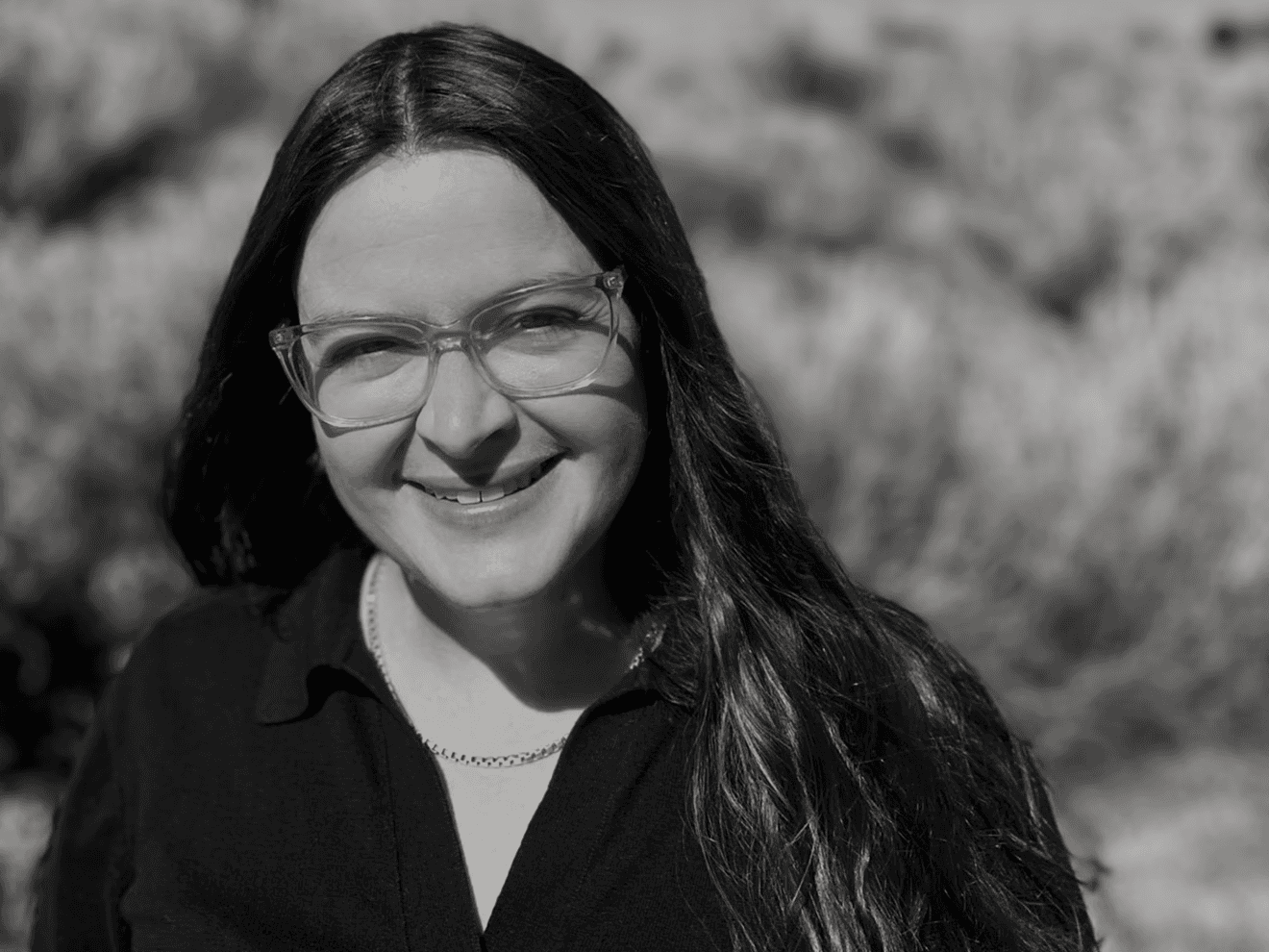 Person pouring Chemical in flask