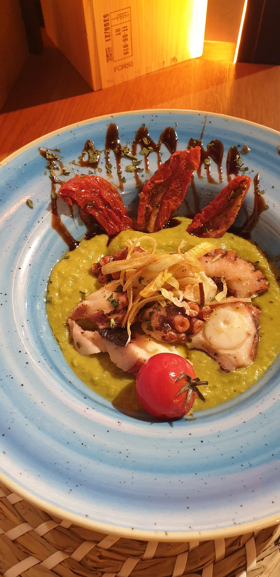 Pasta dishes served on decorative plates.