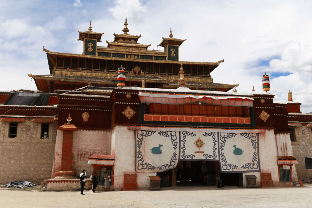 a building with flags flying in front of it