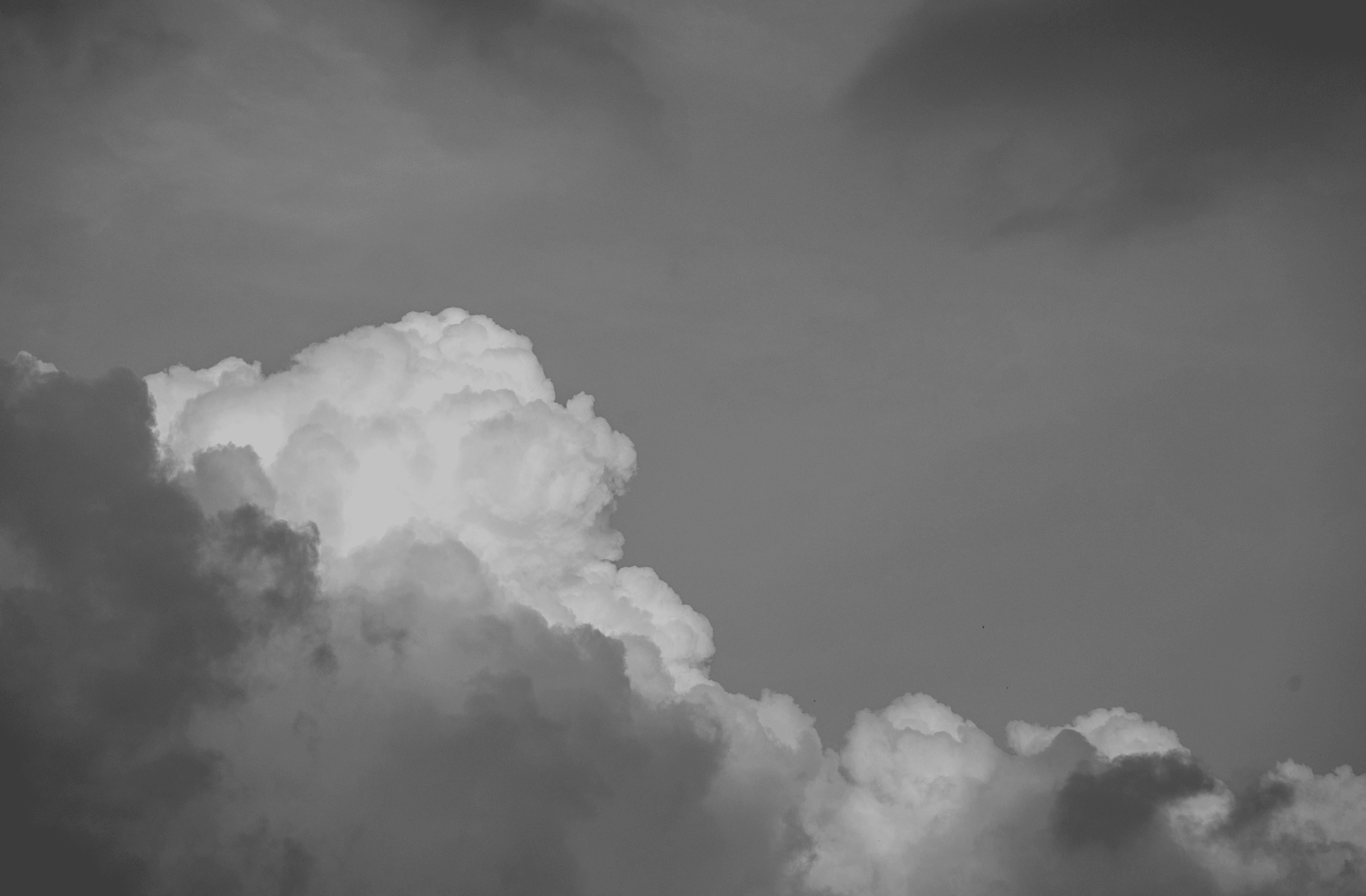 Dramatic clouds in a dark sky viewed from above