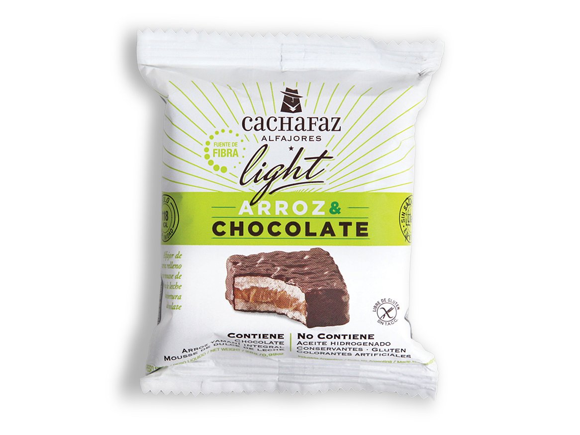 Rooftops of a coastal town with the sea in background