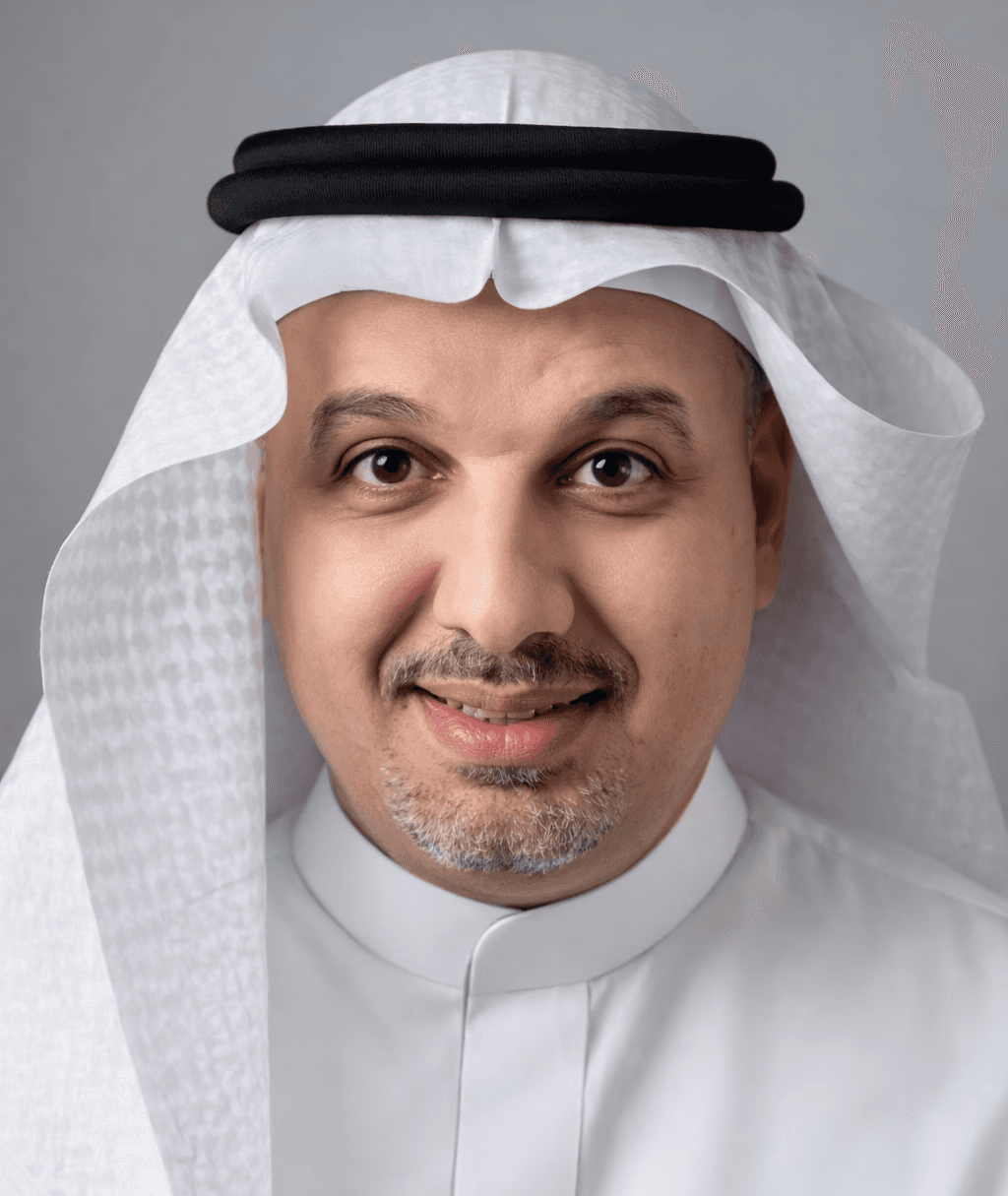 gray metal building frame near tower crane during daytime