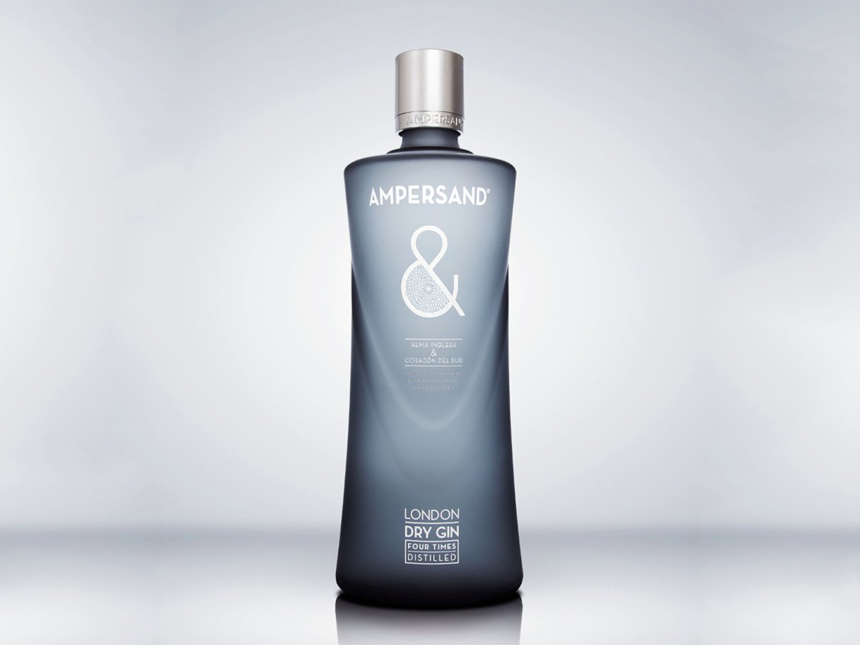 Rooftops of a coastal town with the sea in background