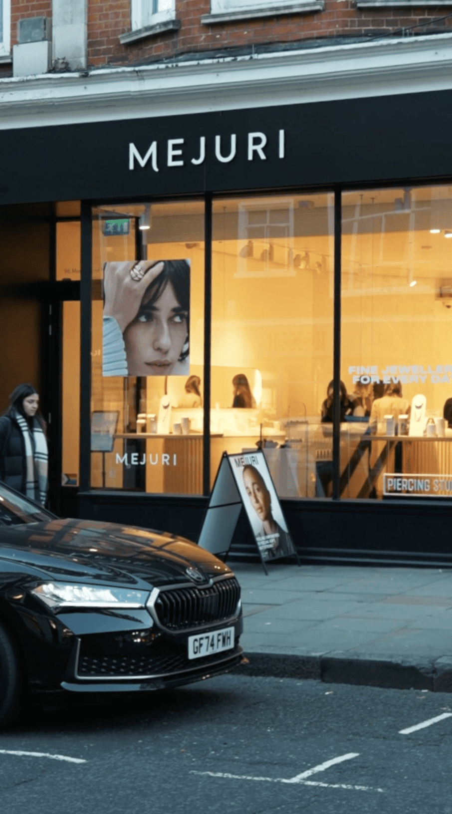 Close-up of bride and groom's torsos, bride in white dress