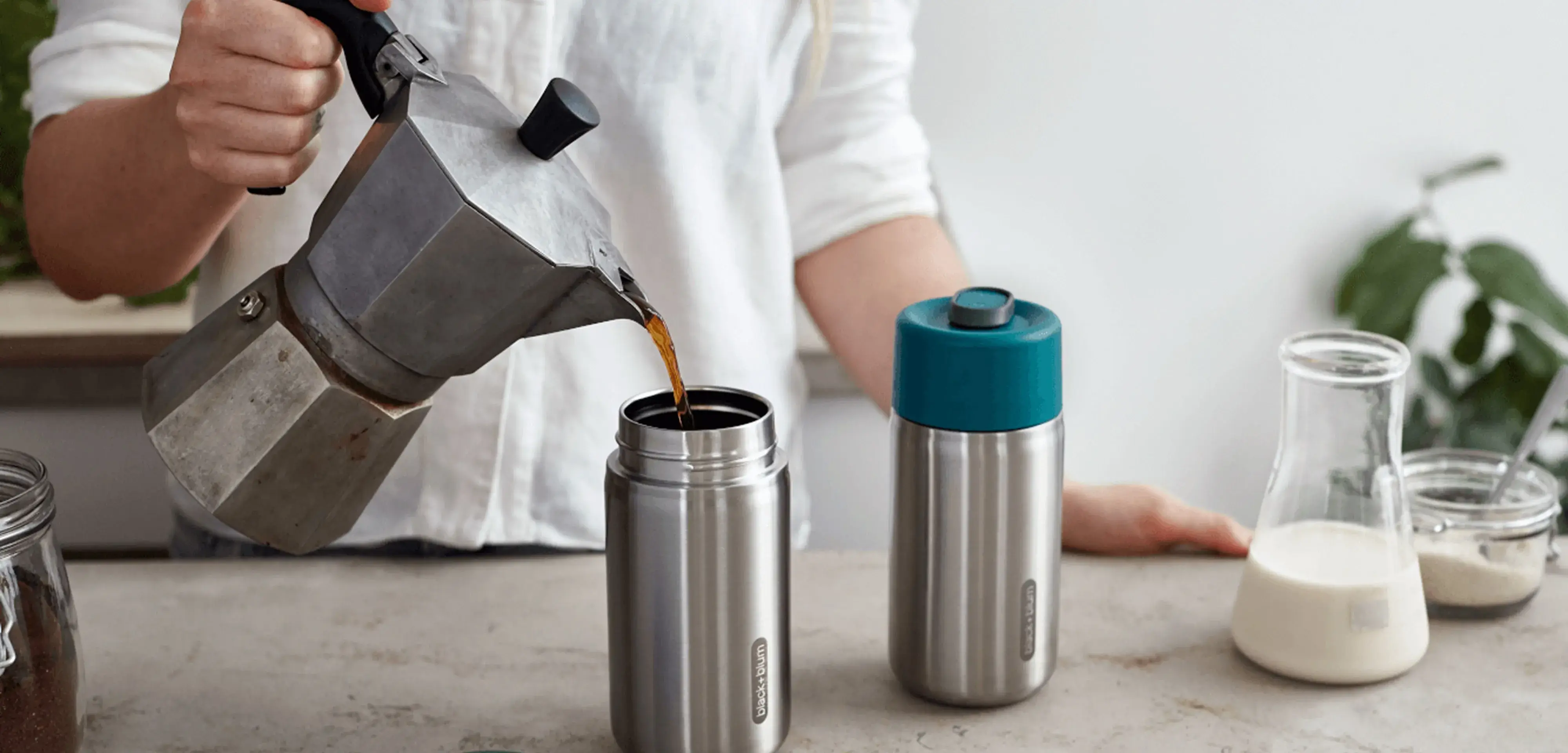 a group of rocks sitting on top of a beach