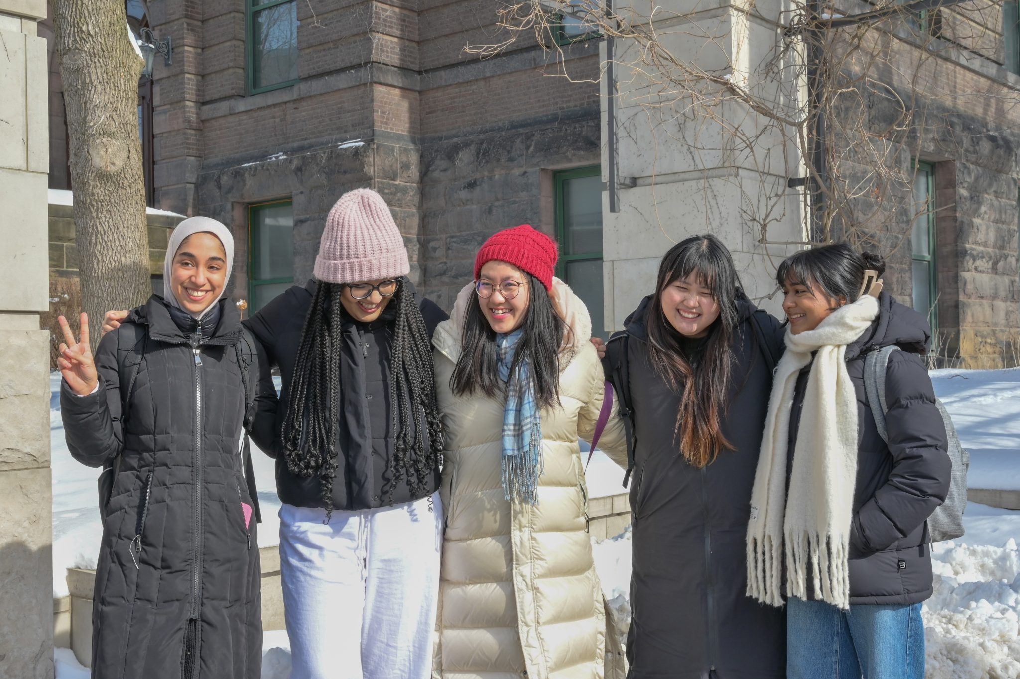 people in a large building with Tate Modern in the background