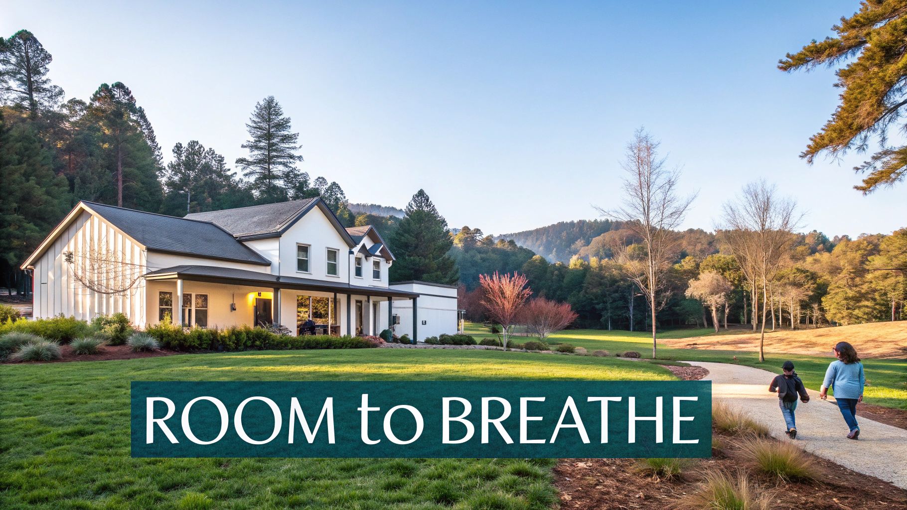 White farmhouse, green lawn, and distant trees under blue sky. Two people walk on a path. 'ROOM to BREATHE' text.