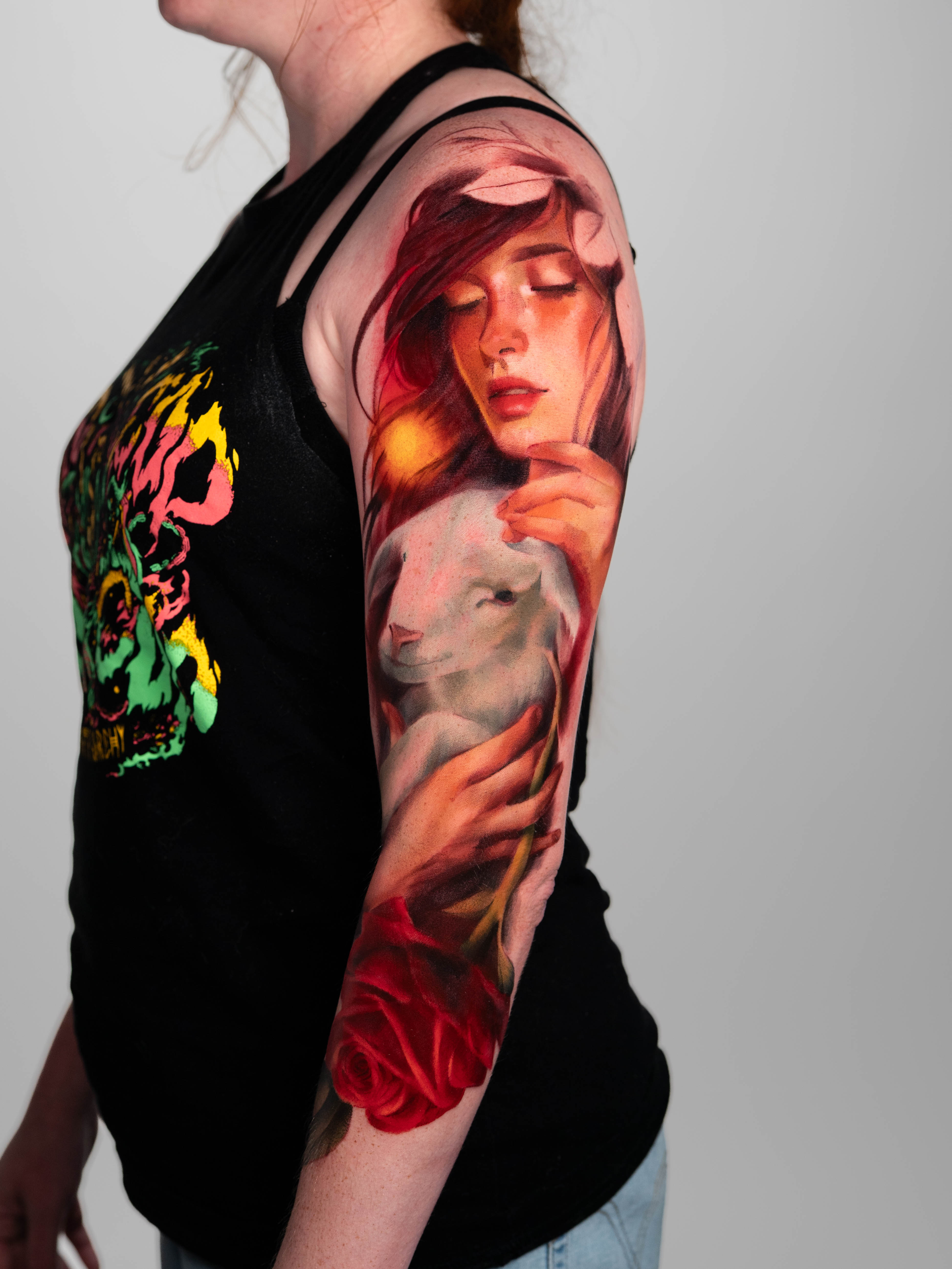 Leg tattoo with celestial and geometric patterns.