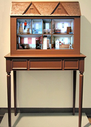 a table with a house model