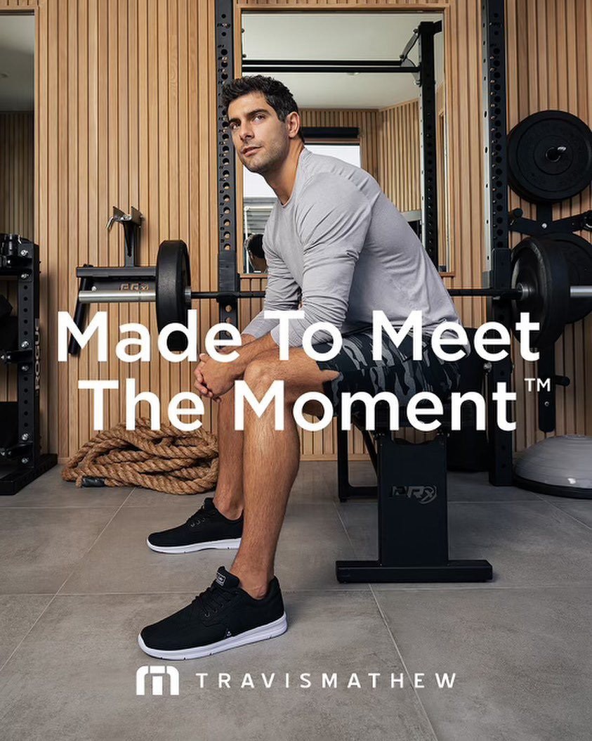 Man seated in a home gym, "Made To Meet The Moment" text