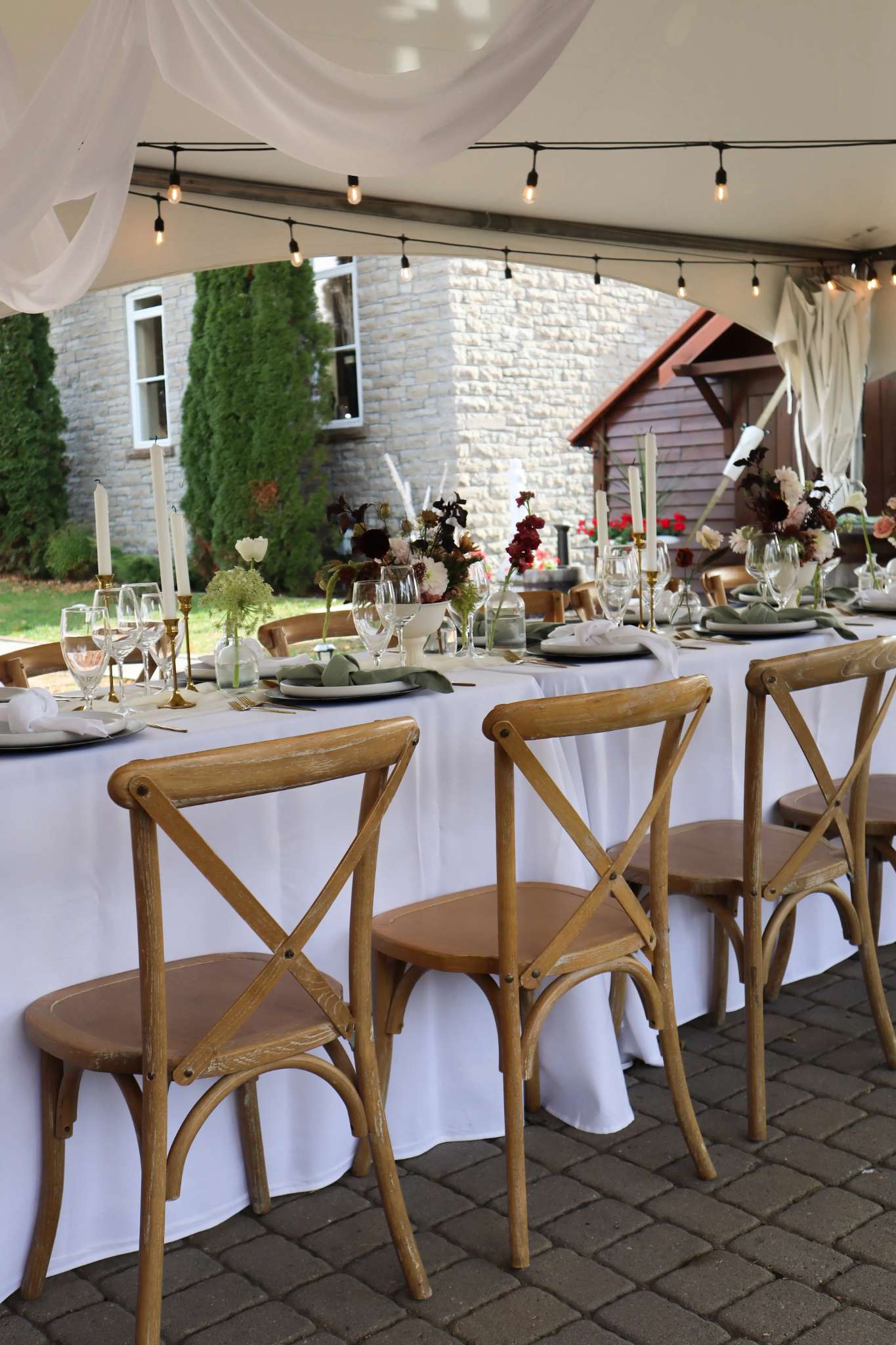 Wine and appetizers on garden dining table at Ashlar Ottawa