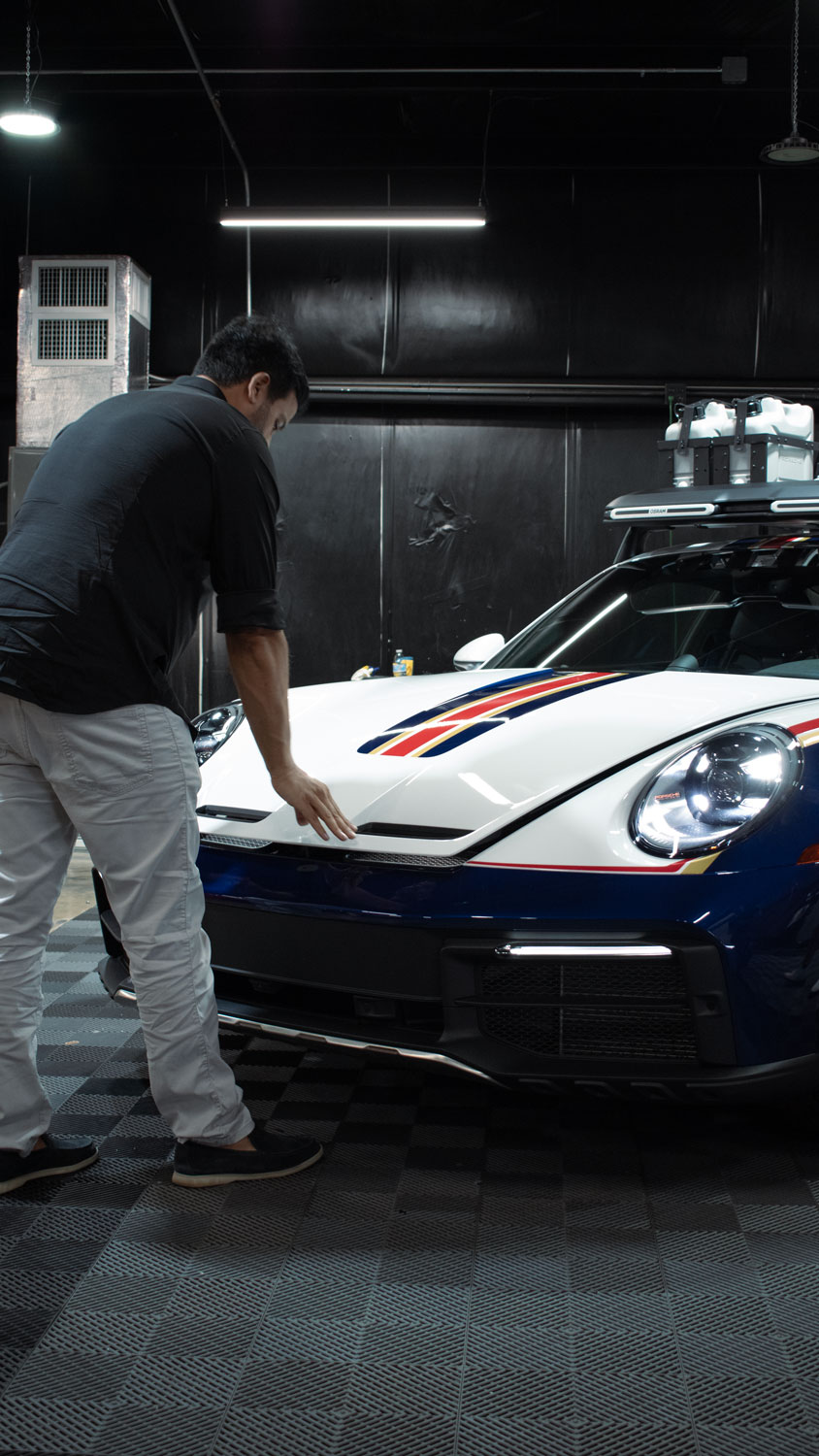 Kamran taking official delivery of his Porsche 911 Dakar after PPF application.