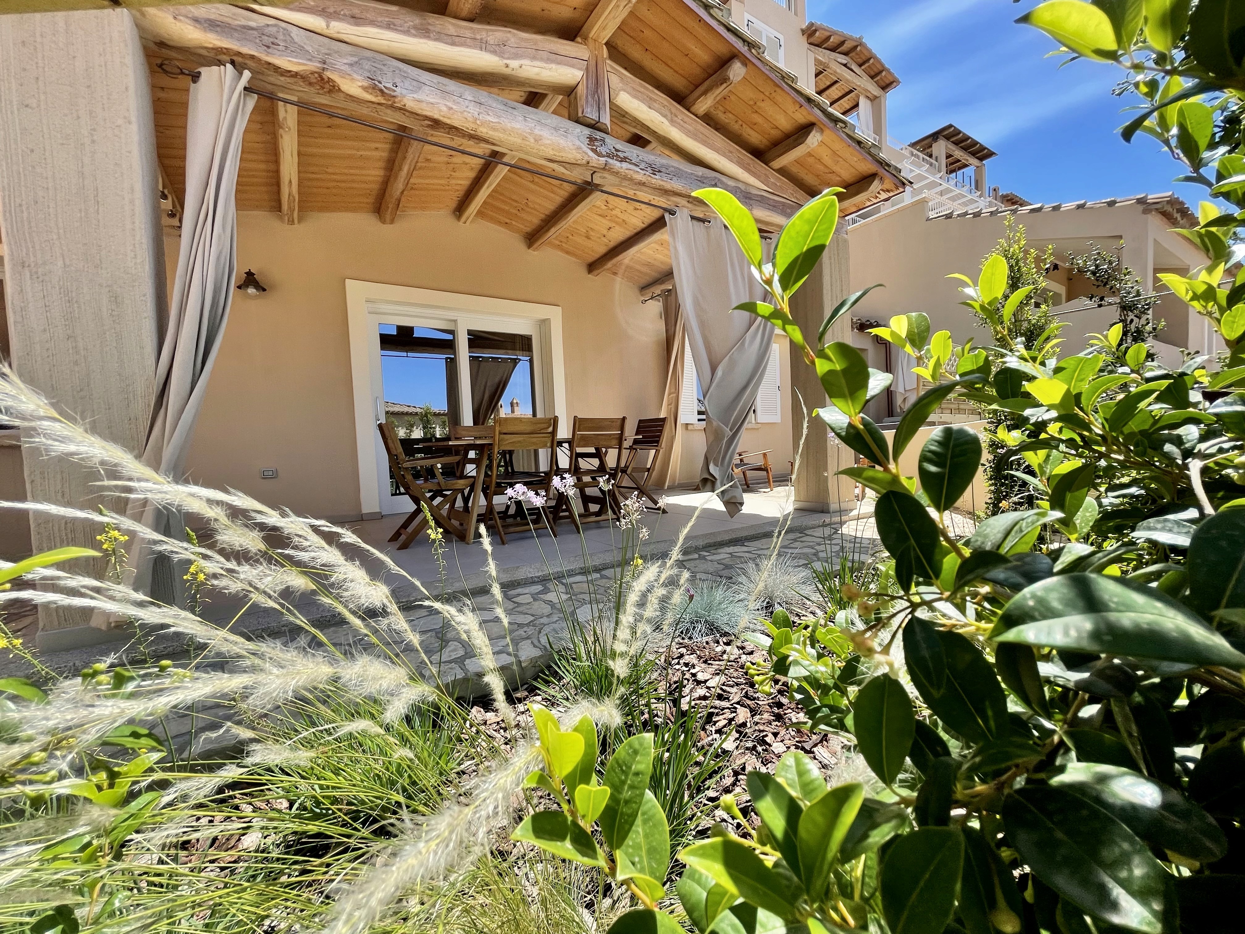 Veranda del Trilocale Shardana Standard con affaccio sul giardino