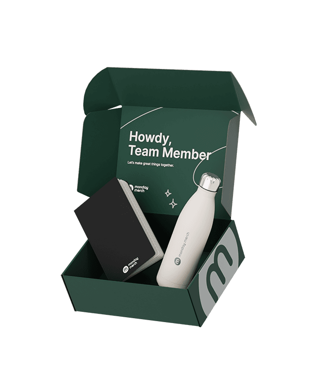 A green box containing a water bottle and a notebook, symbolizing a sustainable lifestyle.