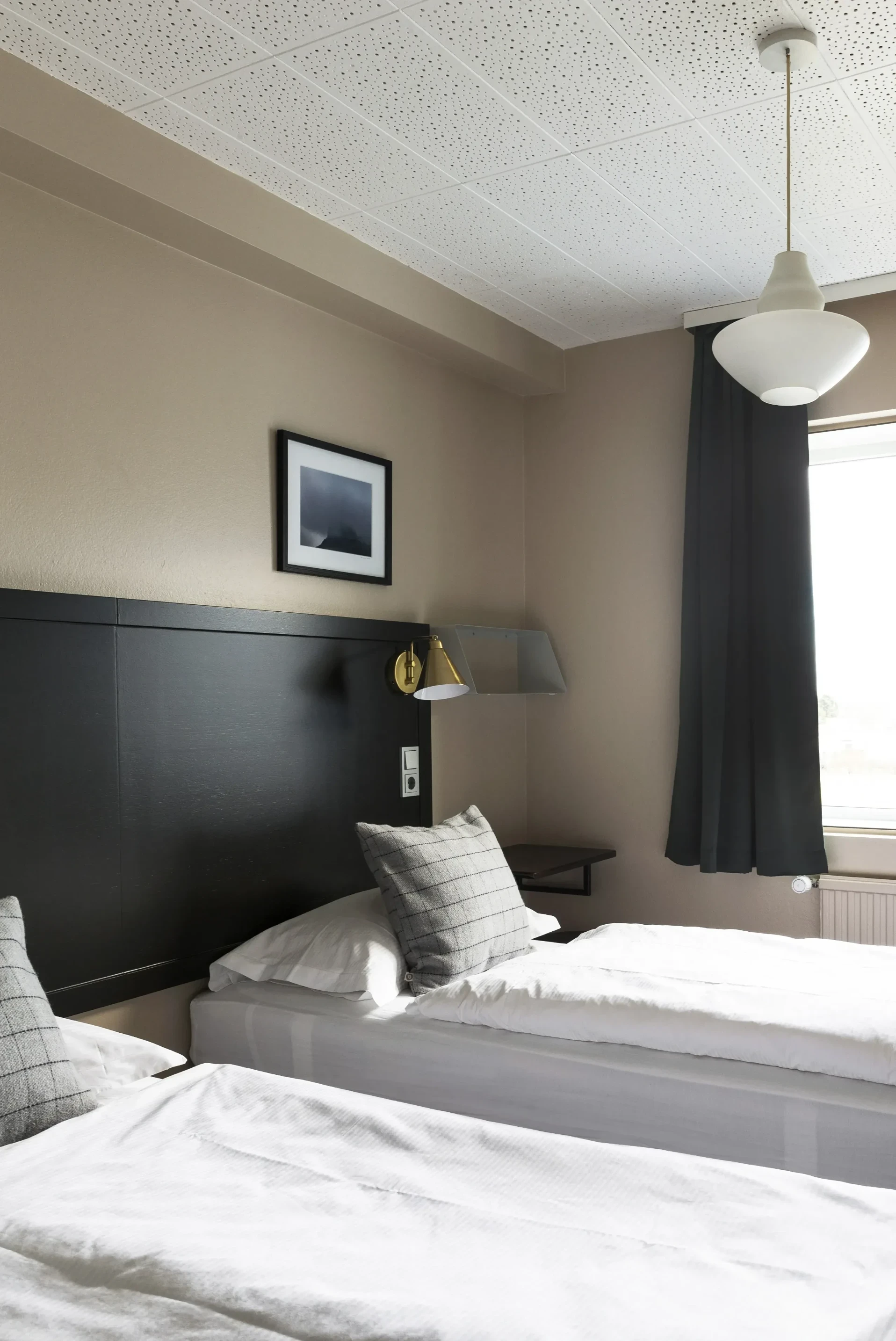 side view of cozy double bed room