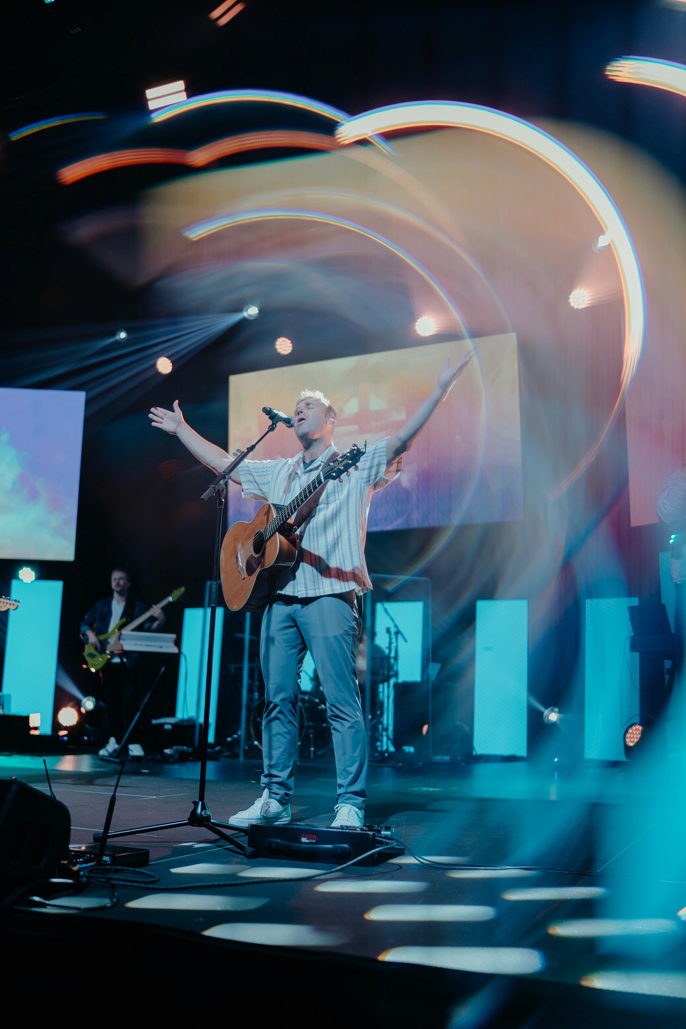 person writing on a piece of paper 