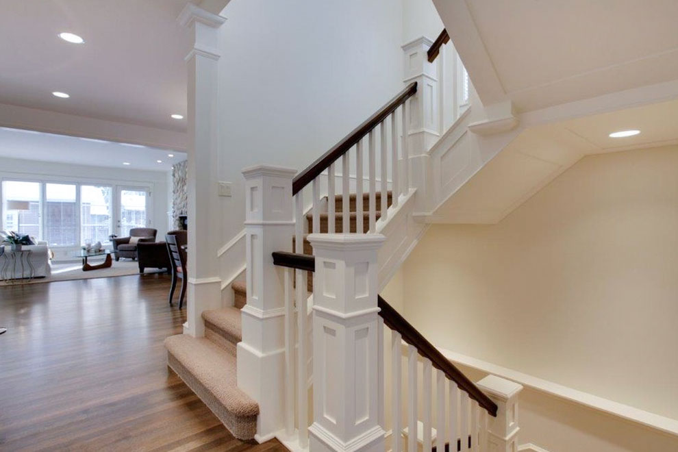 Image of Luxury home interior with staircase, layout design, and living area by KHD Homes design-build construction.