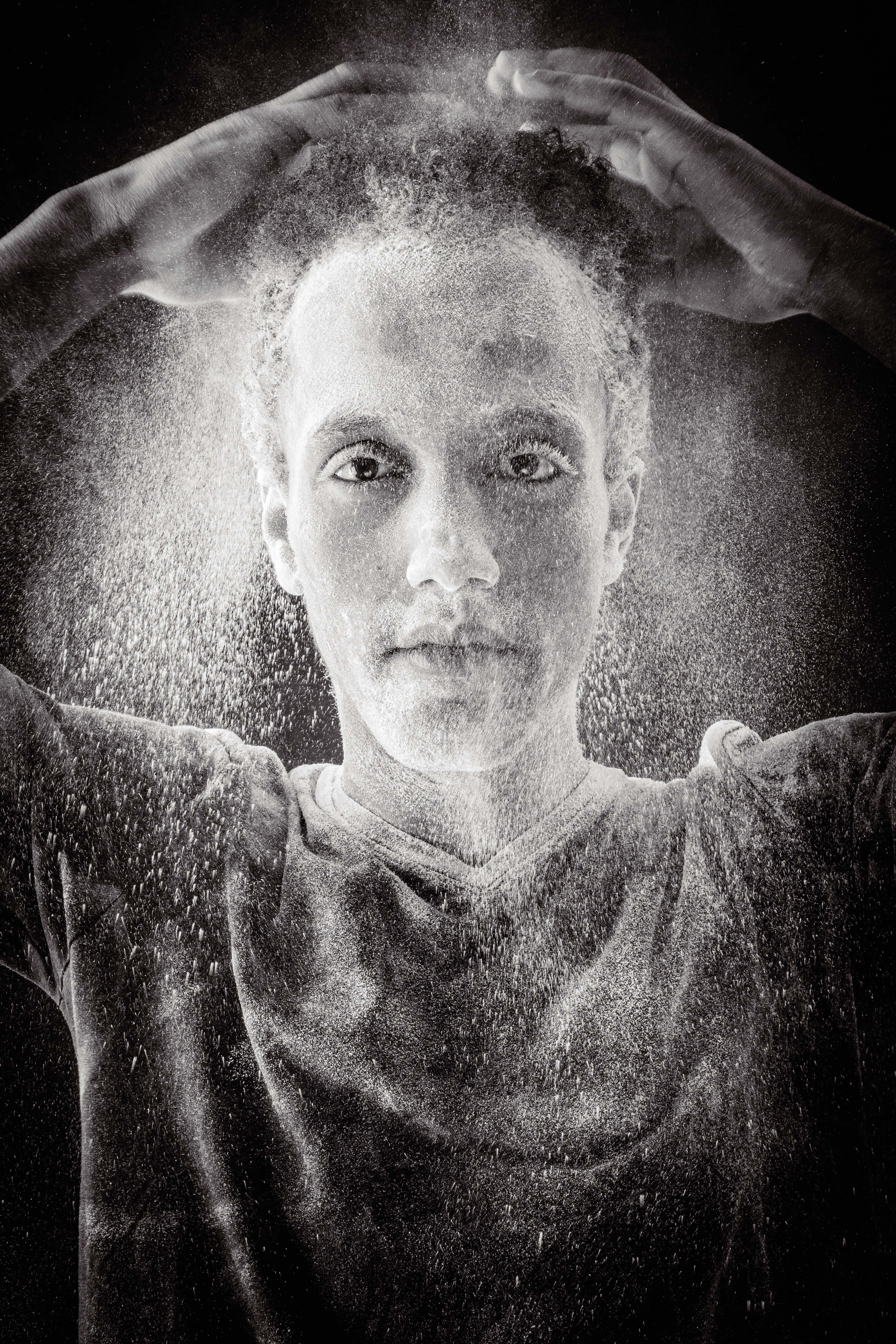 grayscale photo of bike on wall