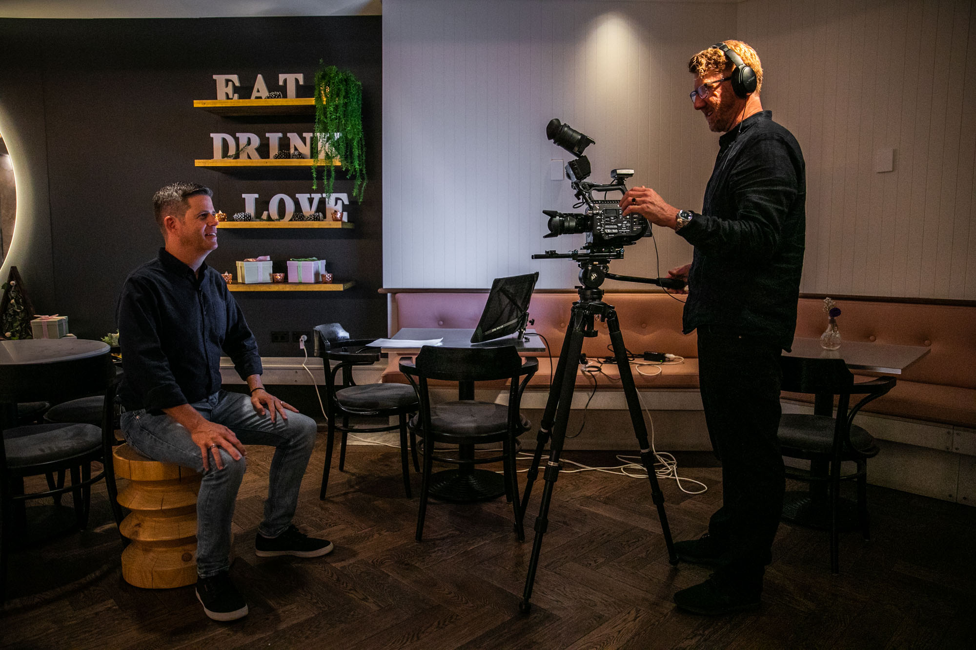 Woman talking to a Man using Mic