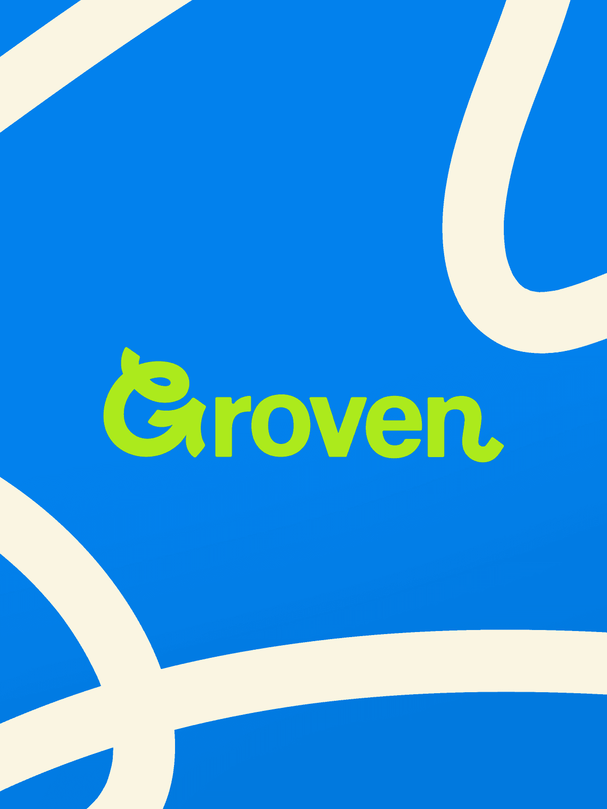 Modern home office setup with a monitor, ergonomic chair, keyboard, and indoor plants near a window with blinds.