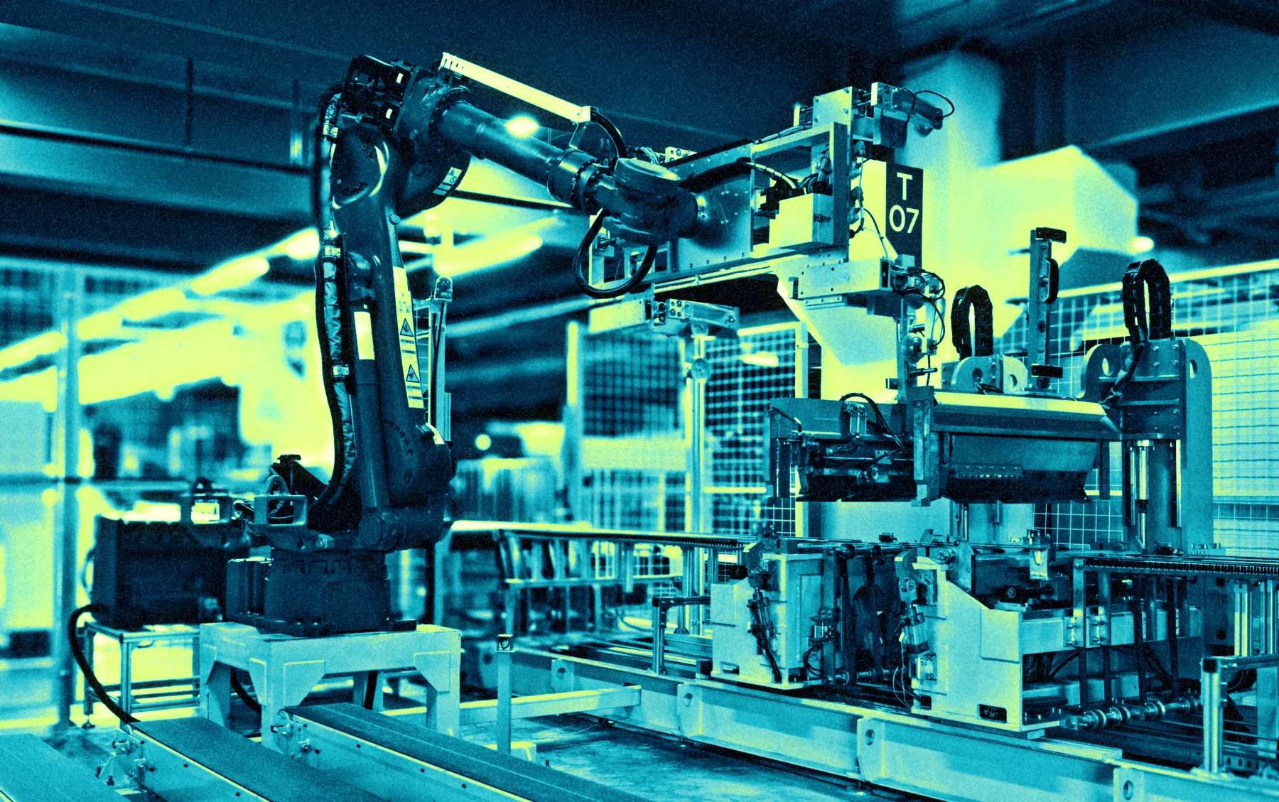 An industrial robot arm in false colour