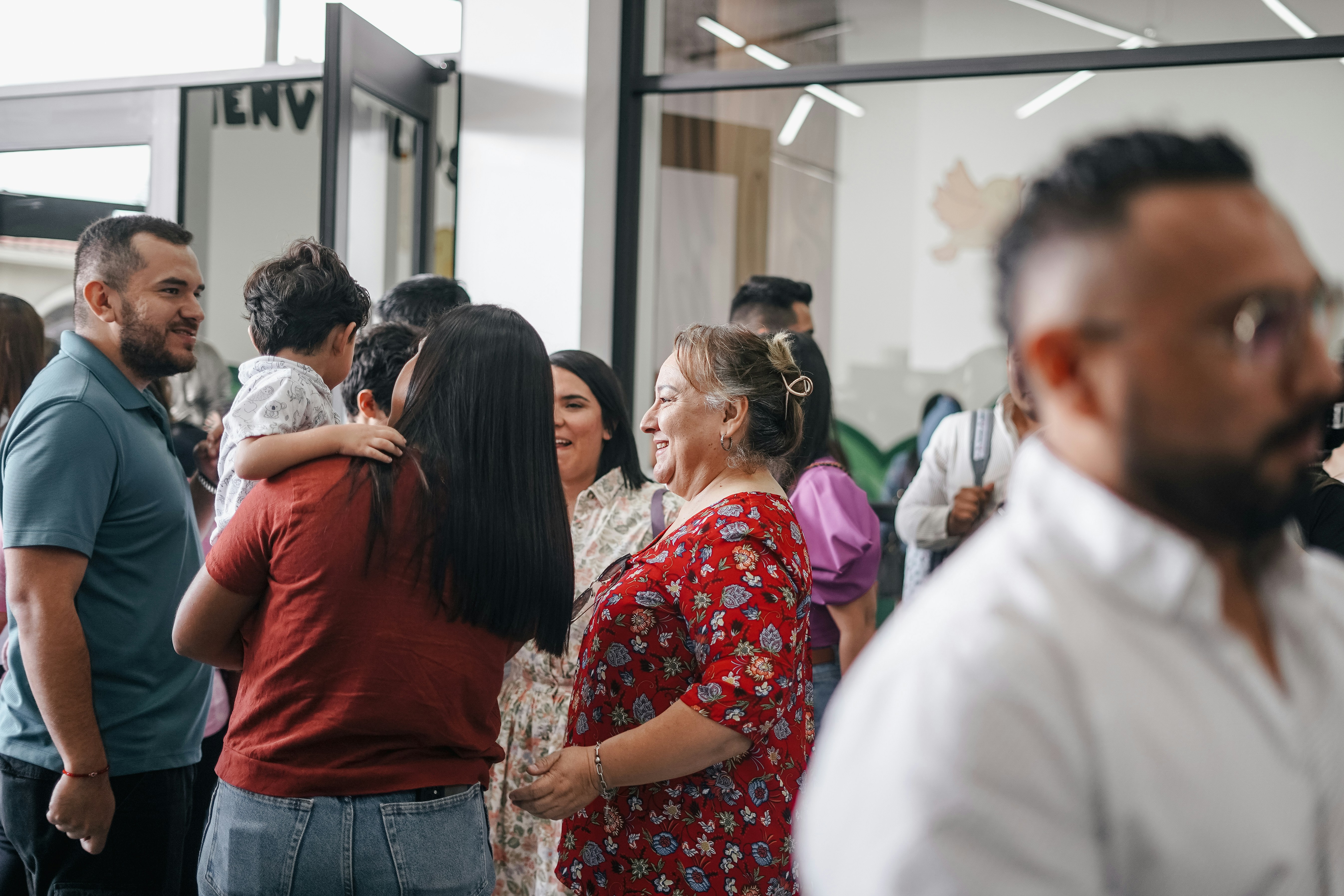 friendly female pediatrician touches shoulder teenage
