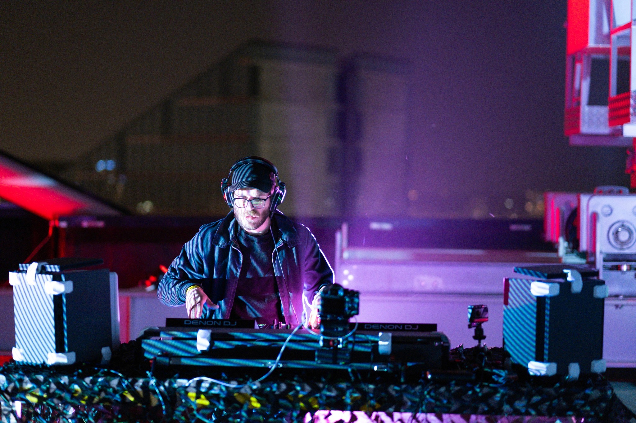 DJ mixing on a rooftop in brussels