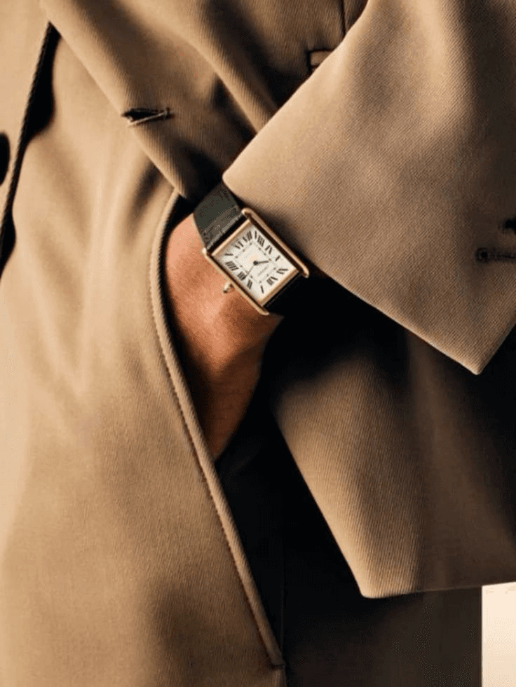 husband and wife working happily on a laptop